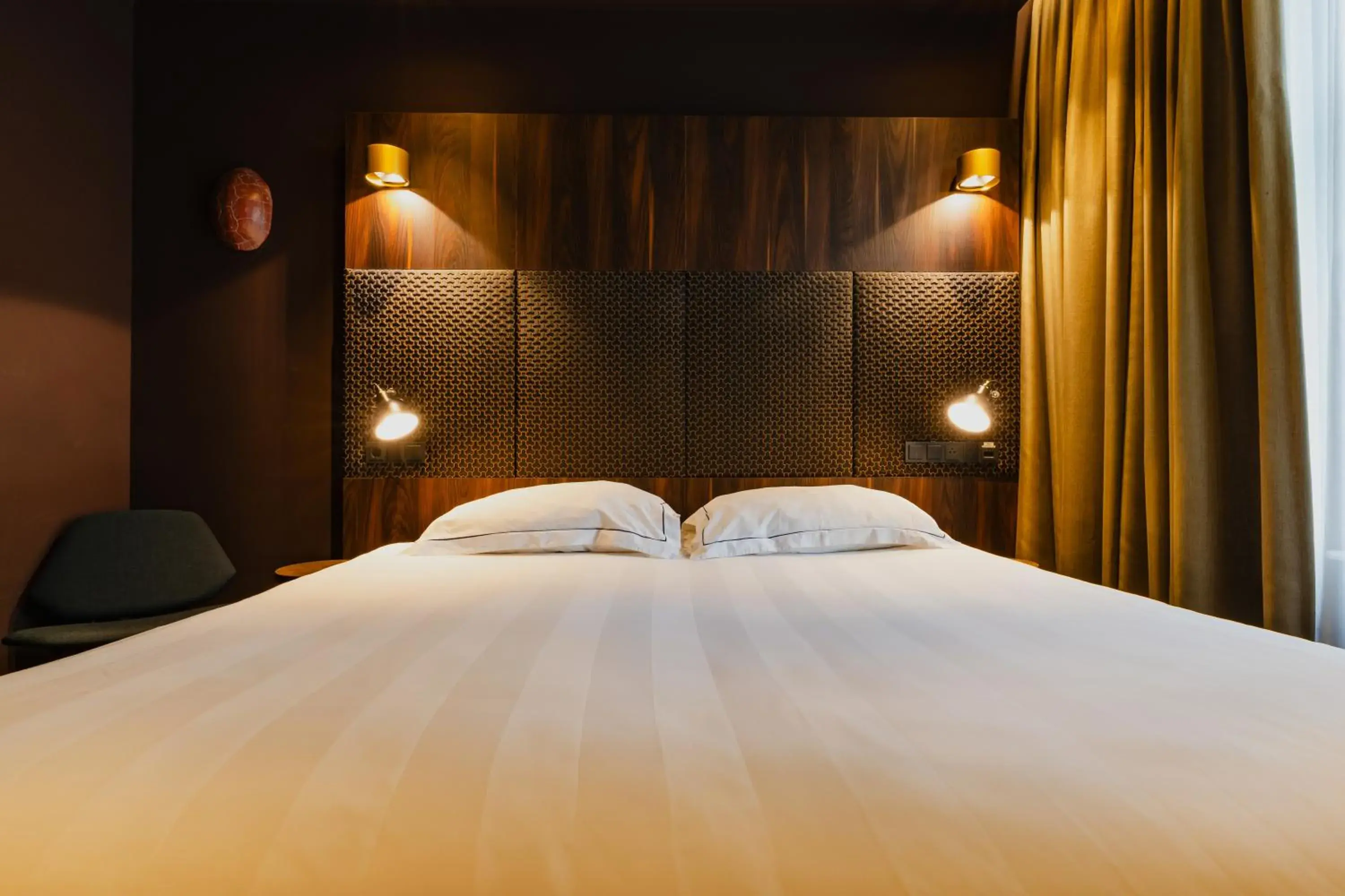 Bed in De Jonker Urban Suites Bed in De Jonker Urban Suites