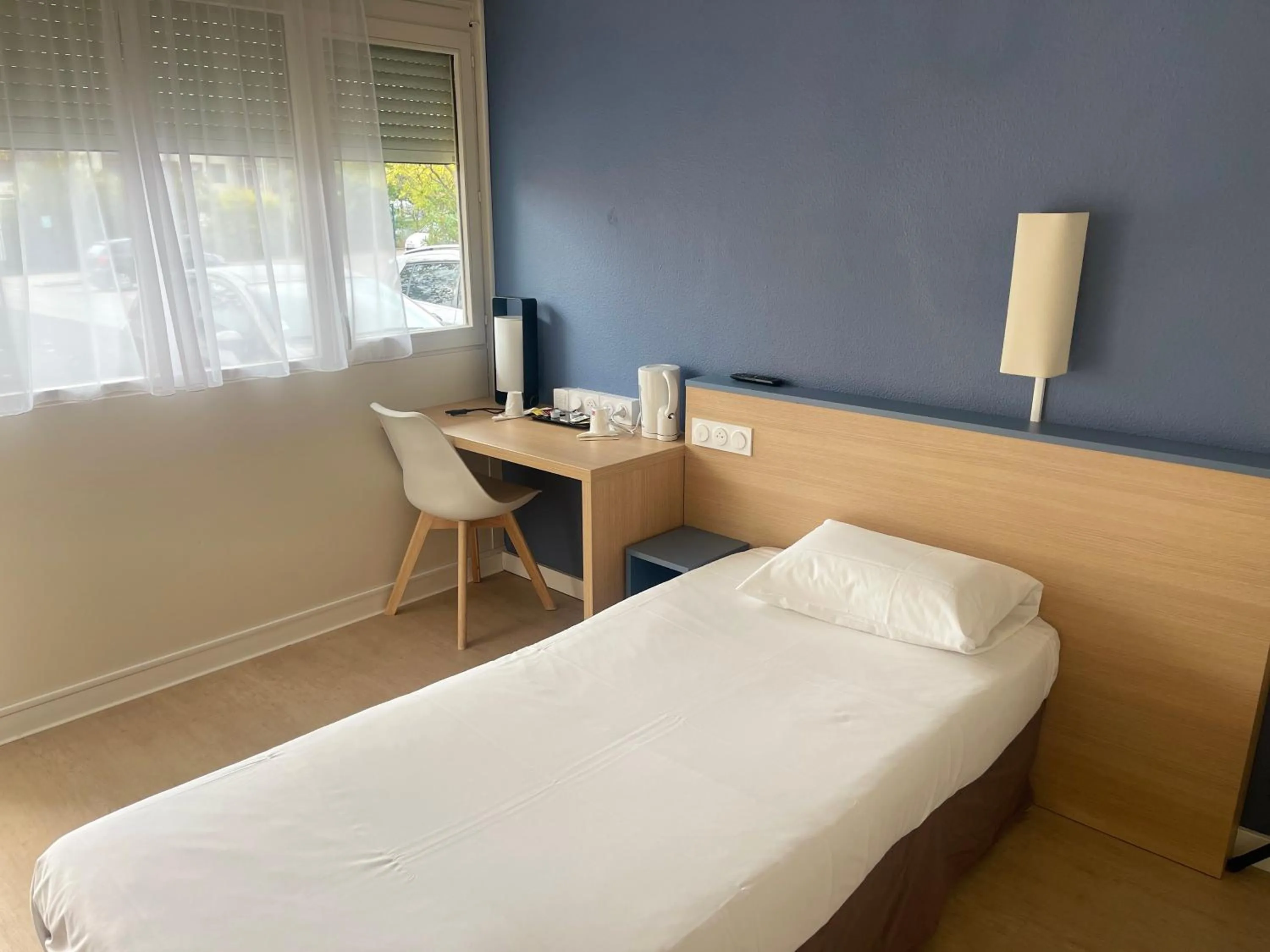 Bed in Kyriad Direct Montpellier Saint Jean De Védas - La Peyrière