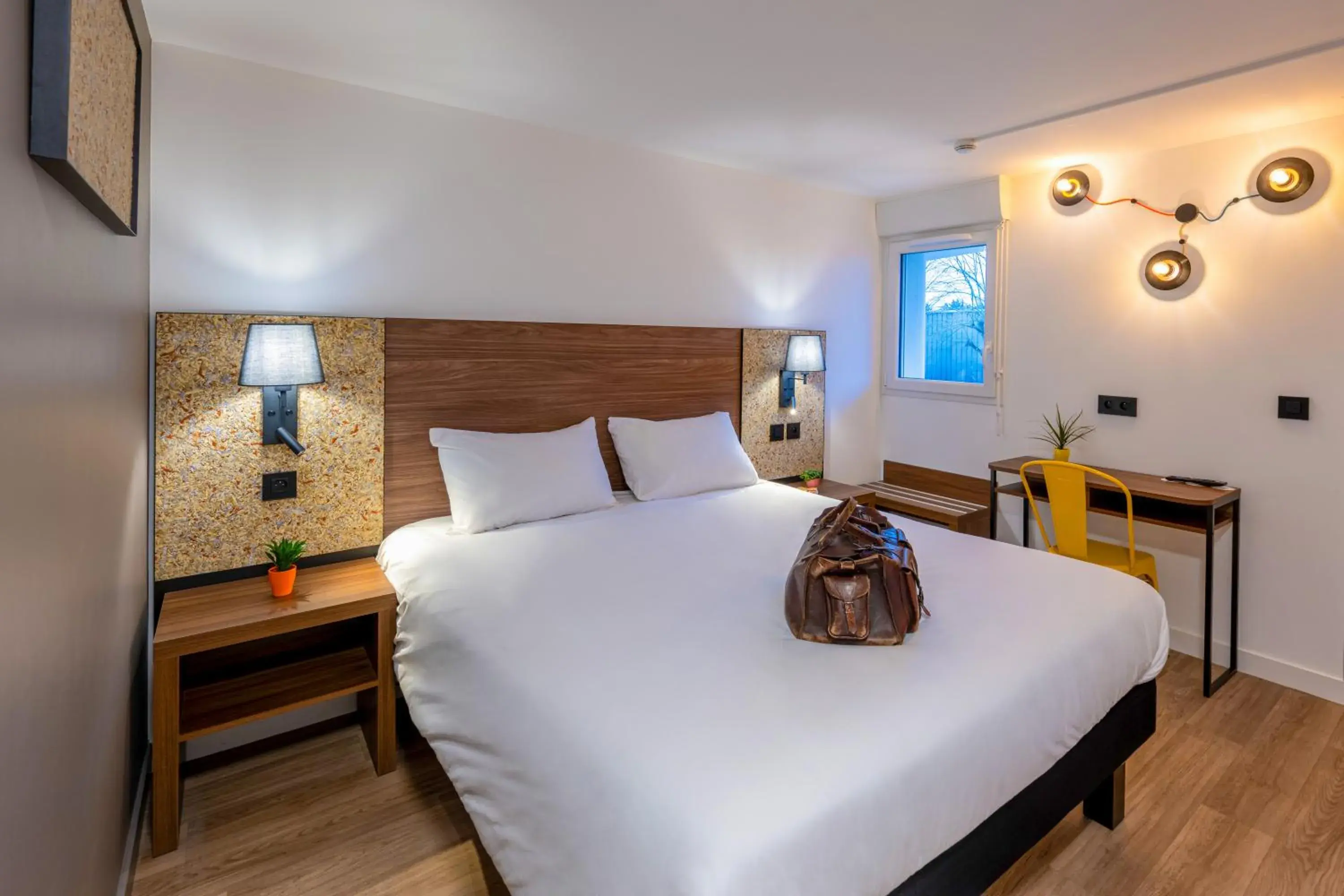 Bed in greet Hotel Chatellerault Bed in greet Hotel Chatellerault