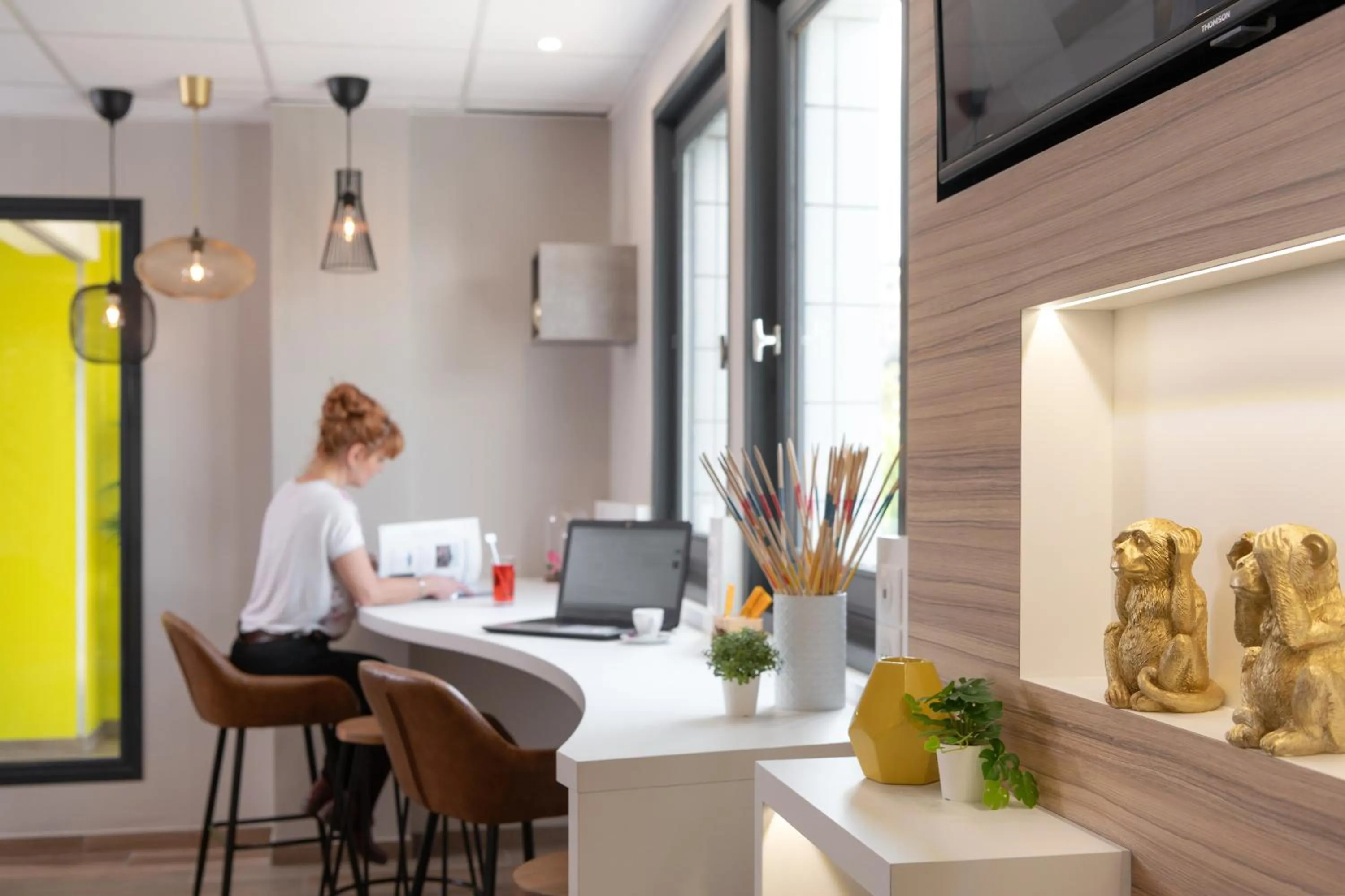 Communal lounge/ TV room in Kyriad Saint-Etienne Centre