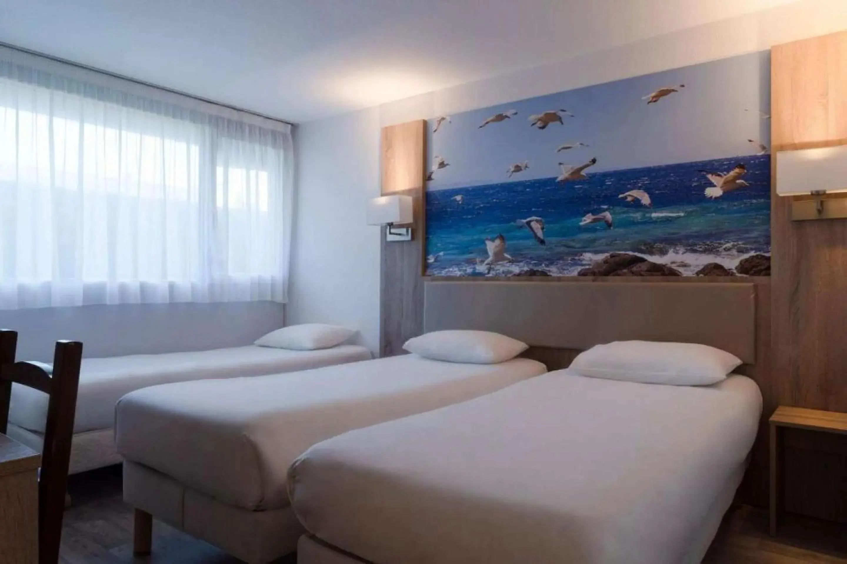 Bedroom, Bed in BRIT HOTEL Confort MORLAIX Bedroom, Bed in BRIT HOTEL Confort MORLAIX