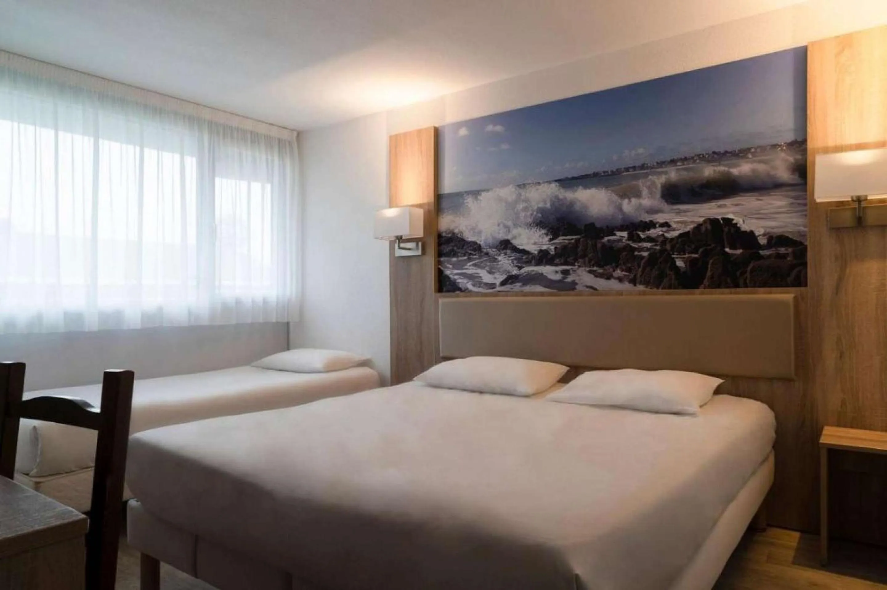 Bedroom, Bed in BRIT HOTEL Confort MORLAIX