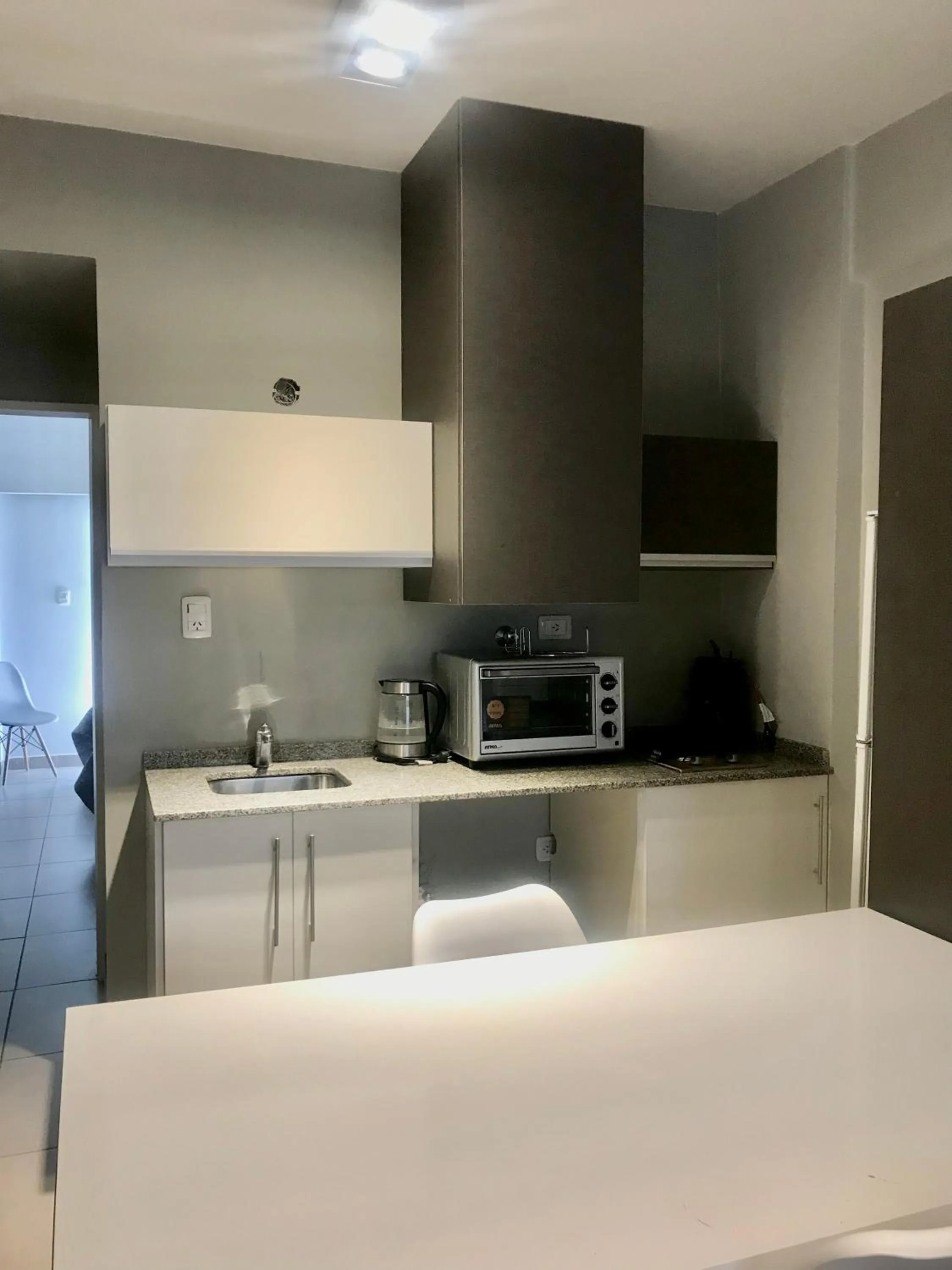 Kitchen or kitchenette in Belle Vie Suites
