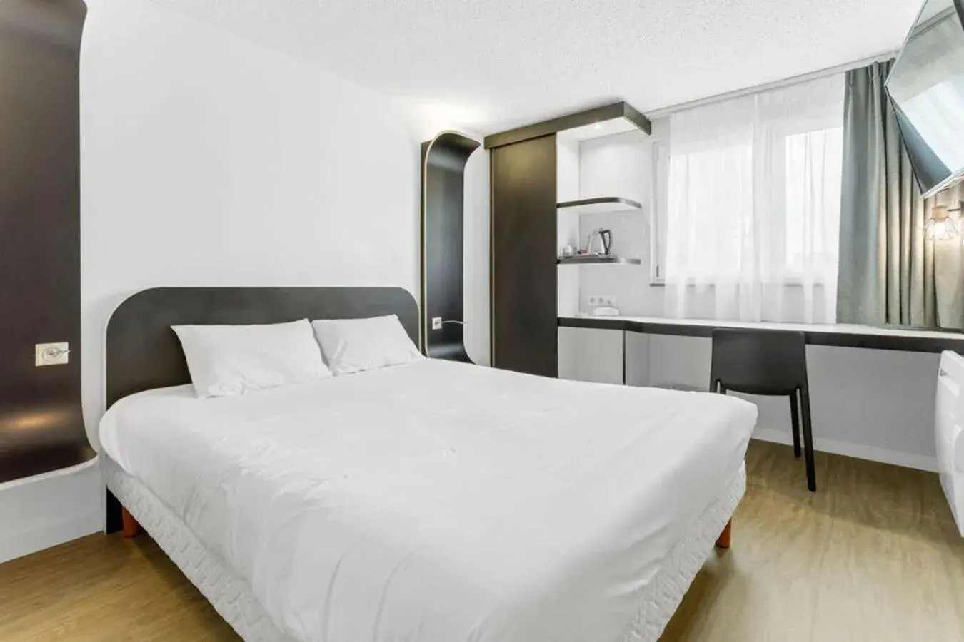 Bed in Kyriad Deauville - St Arnoult Bed in Kyriad Deauville - St Arnoult