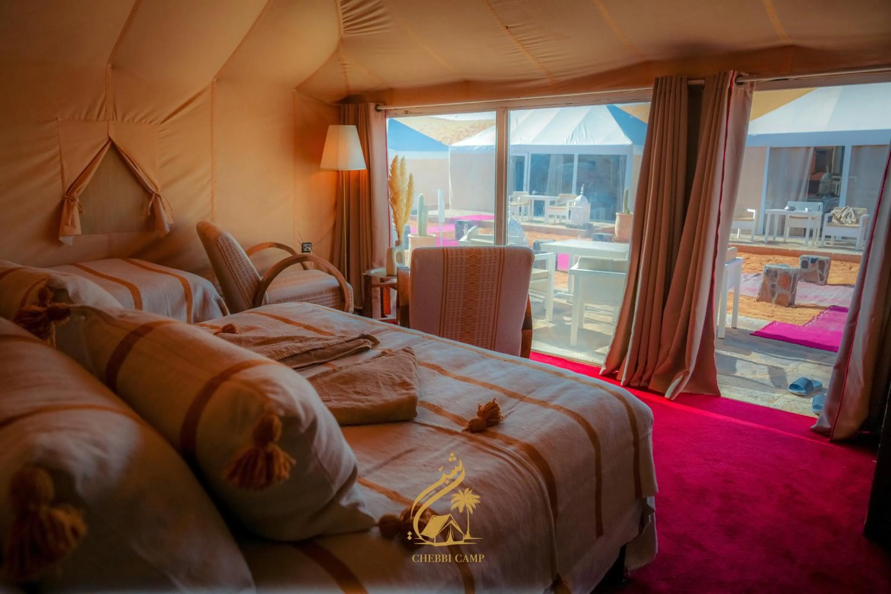 Bed in Luxury Camp Chebbi