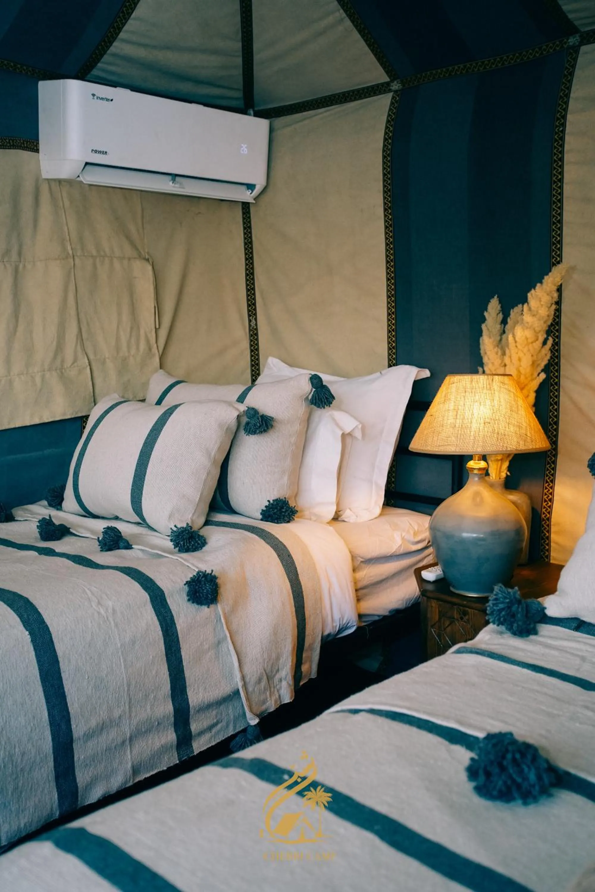 Bed in Luxury Camp Chebbi