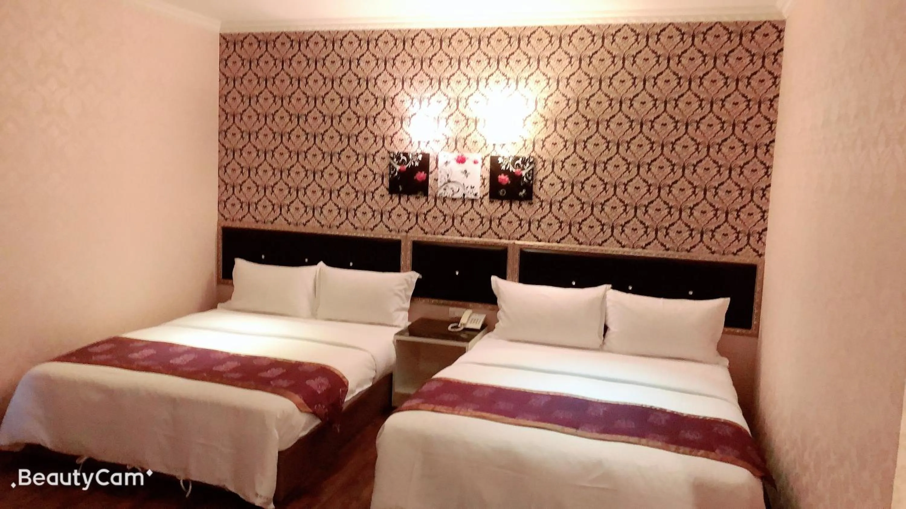 Bed in Jungle City Motel