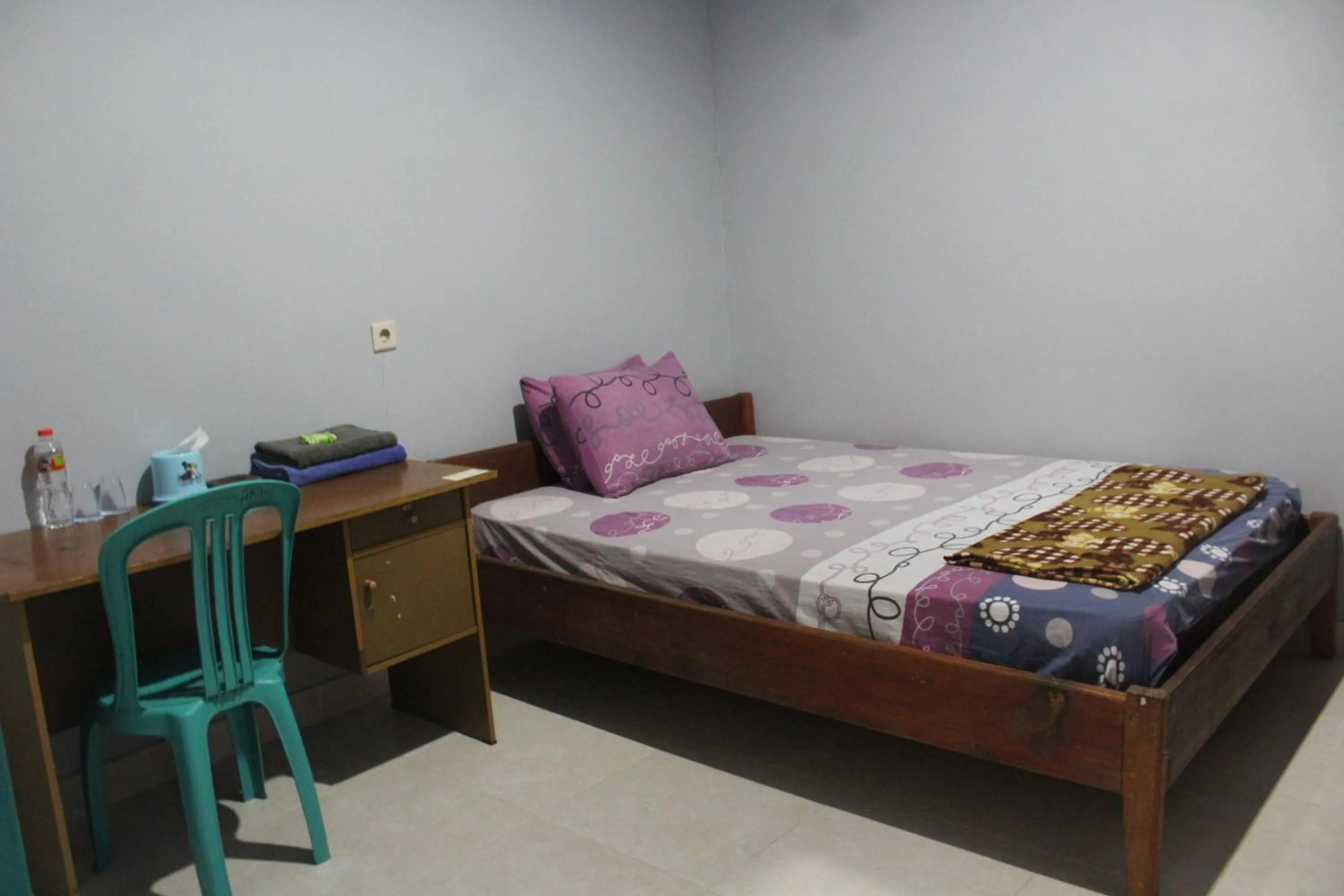 Bed in Penginapan Artha