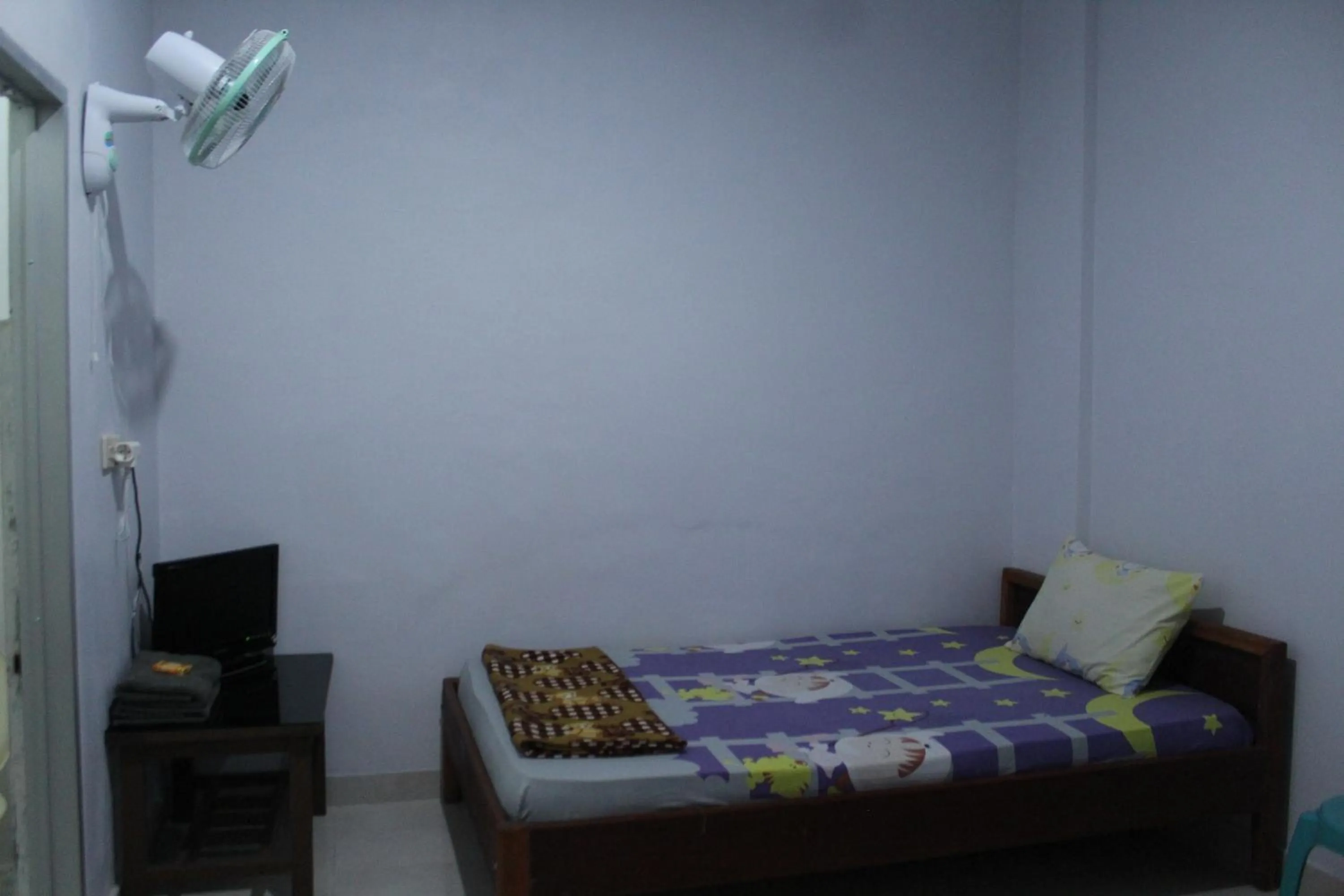 Photo of the whole room, Bed in Penginapan Artha