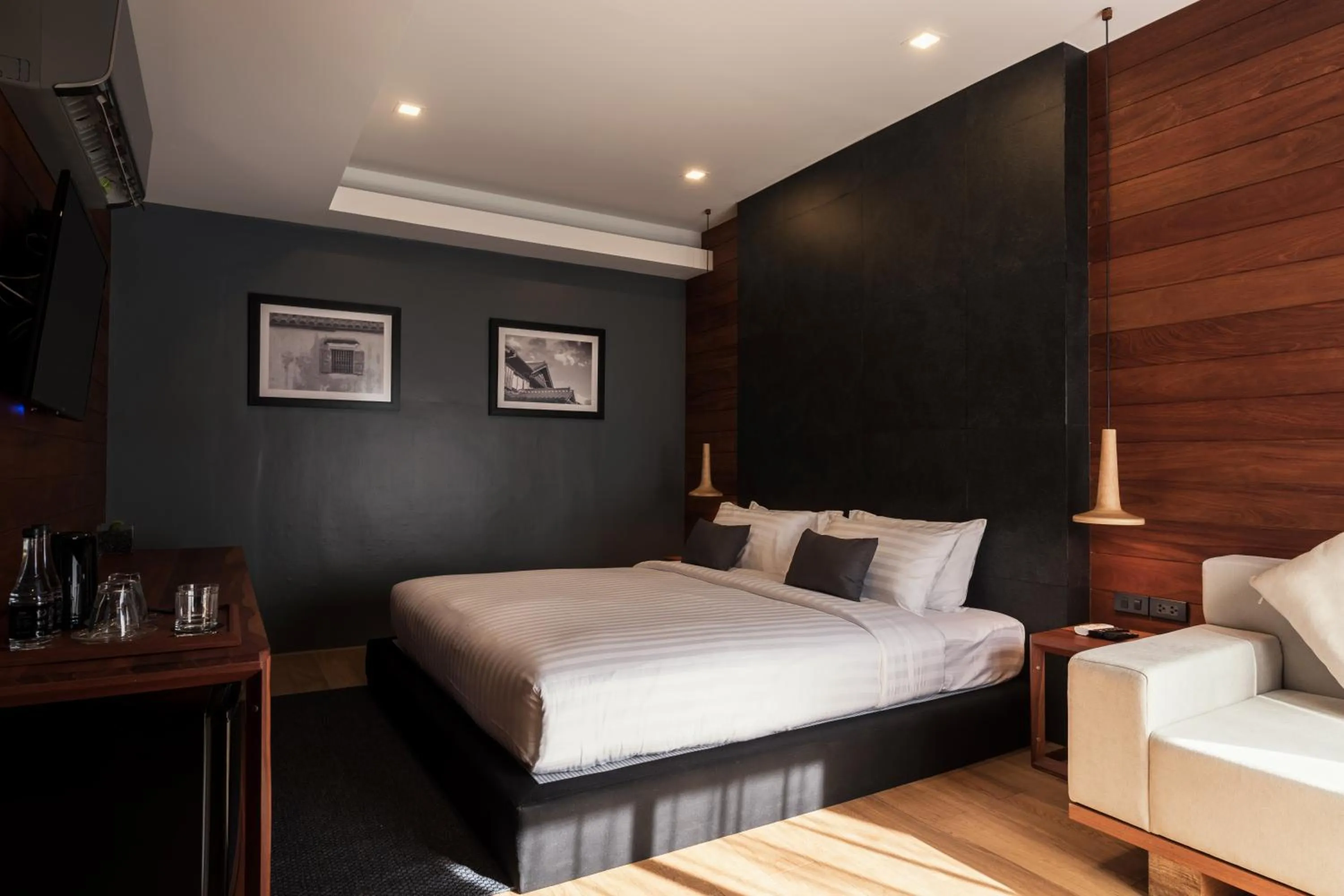 Seating area, Bed in The Habita Hatyai