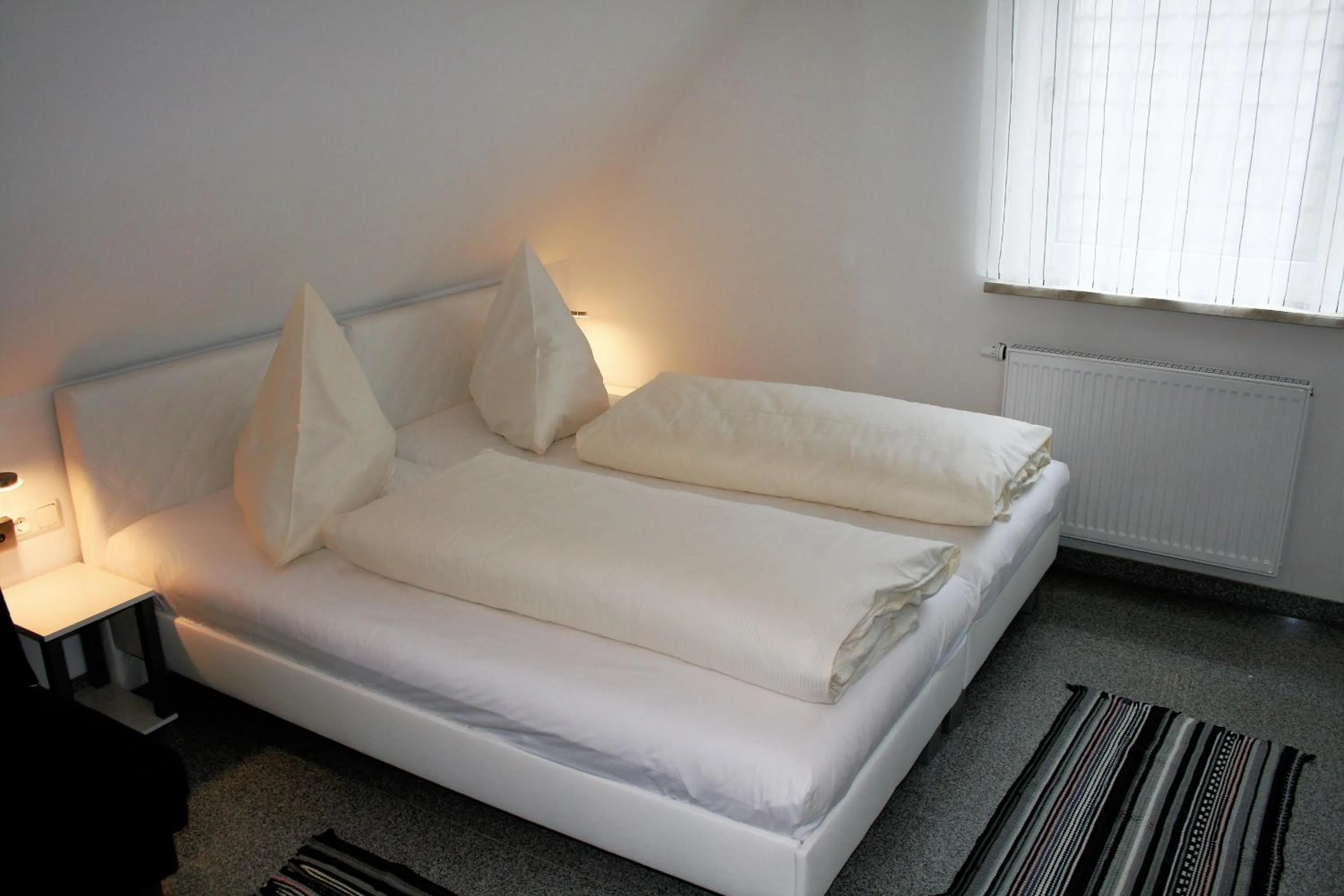 Bed in Haus zum Schlosspark