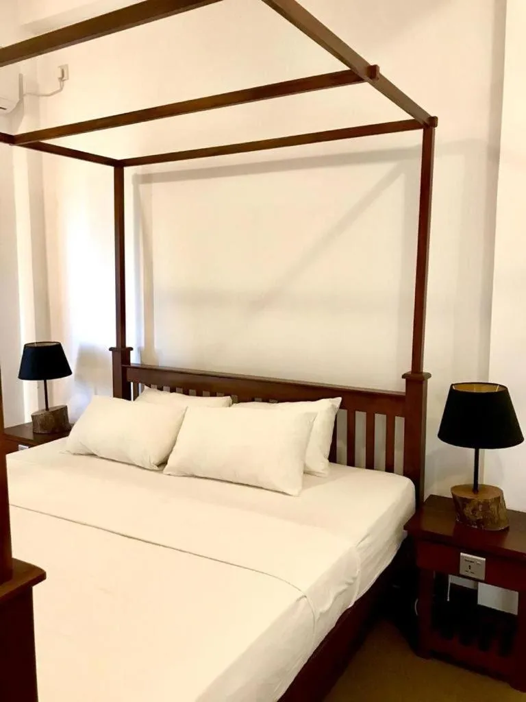 Bed in Iddamal Apartments