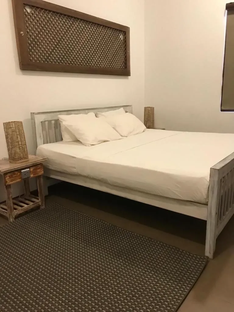 Bed in Iddamal Apartments