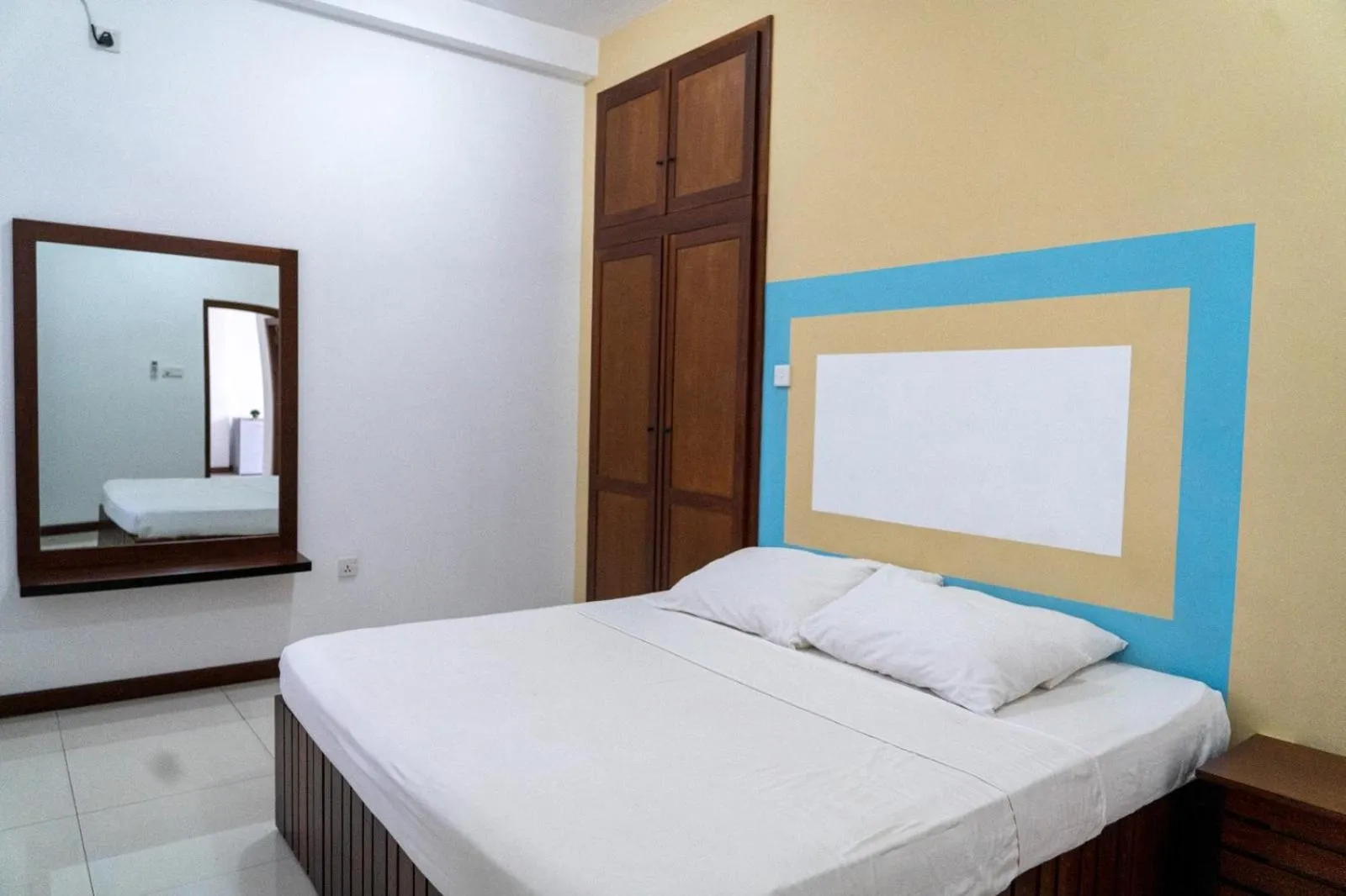 Bedroom, Bed in Iddamal Apartments