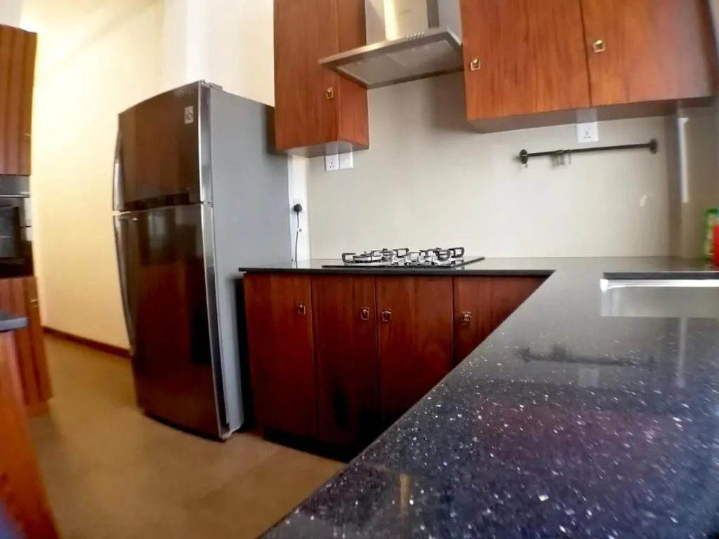 Kitchen or kitchenette in Iddamal Apartments