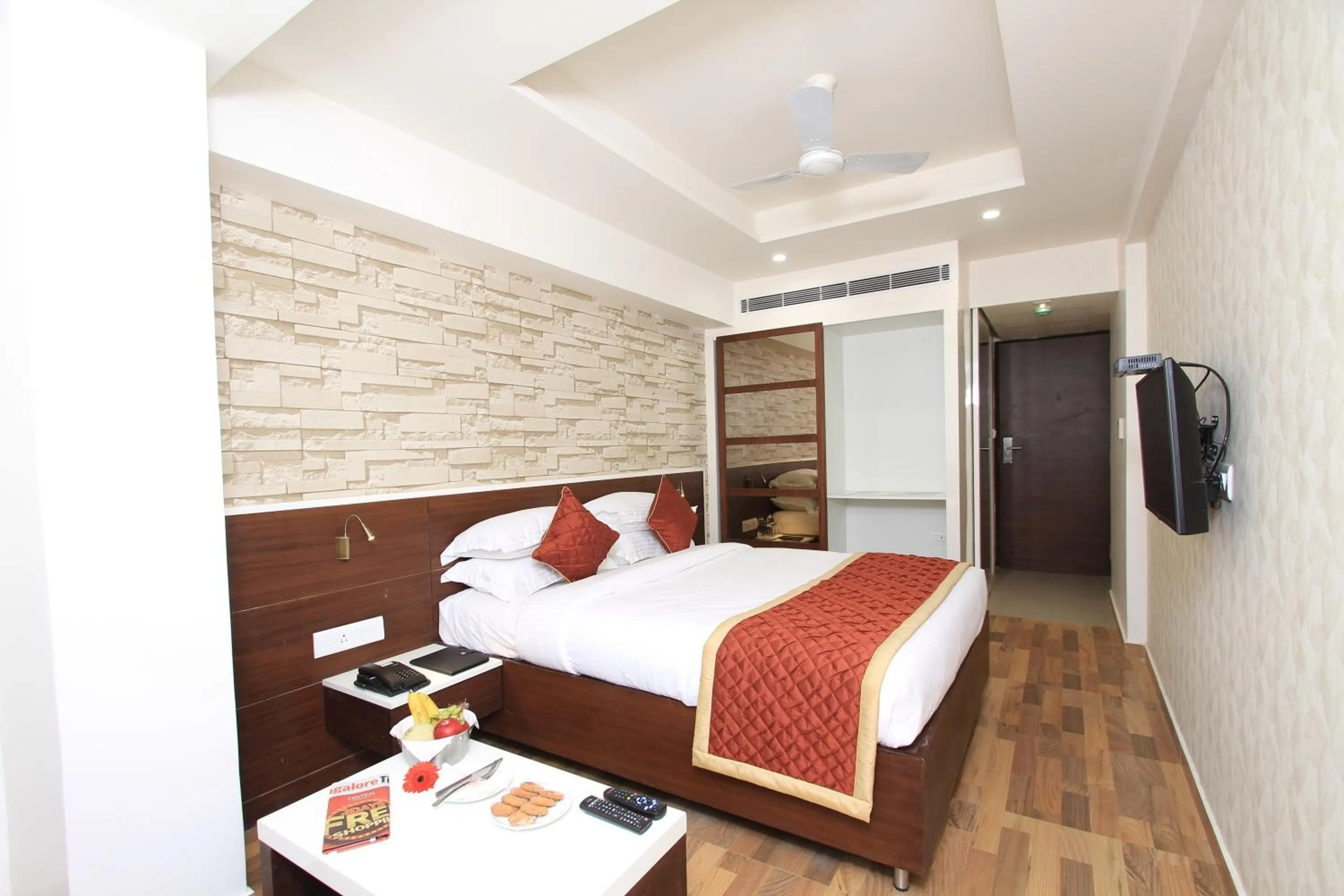 Bed in Icon Business Hotel by Bhagini