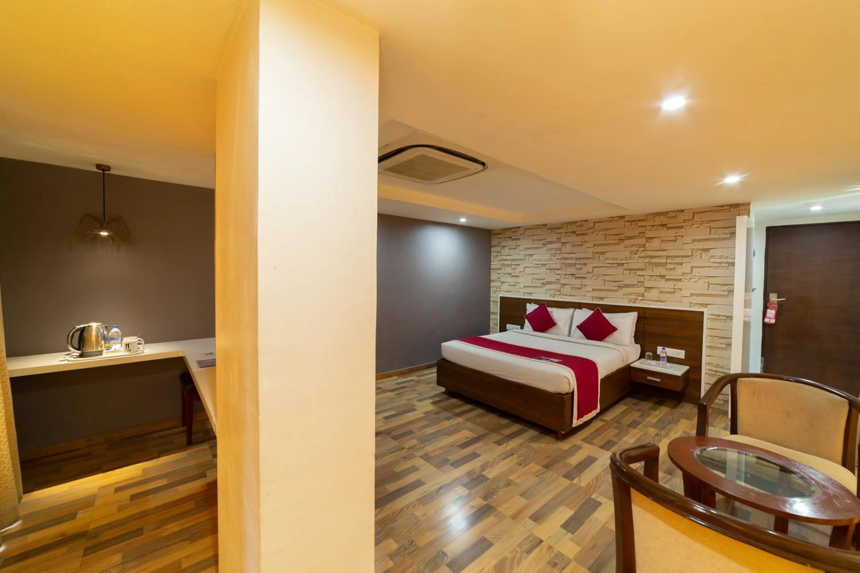 Bed in Icon Business Hotel by Bhagini