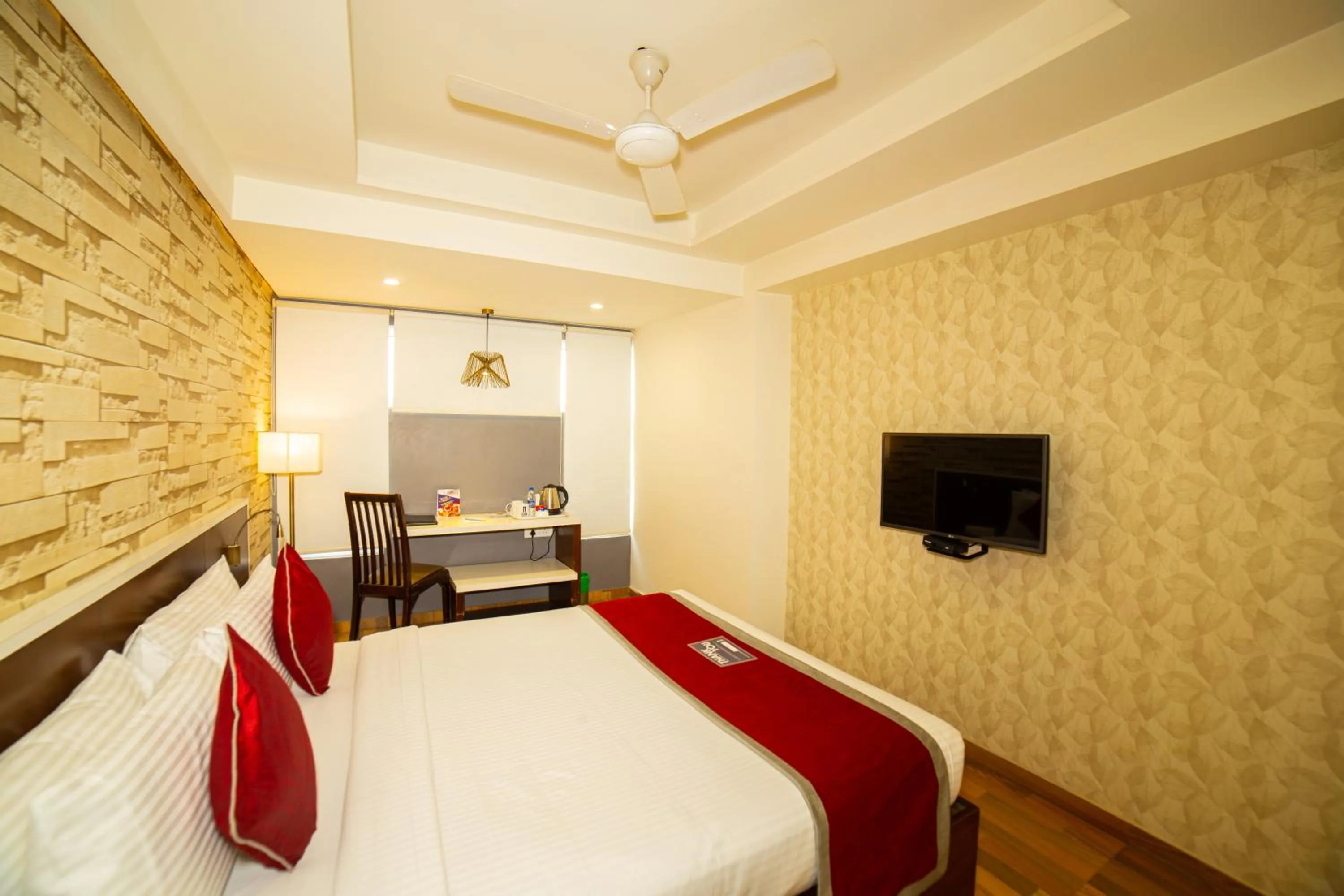 Bed in Icon Business Hotel by Bhagini