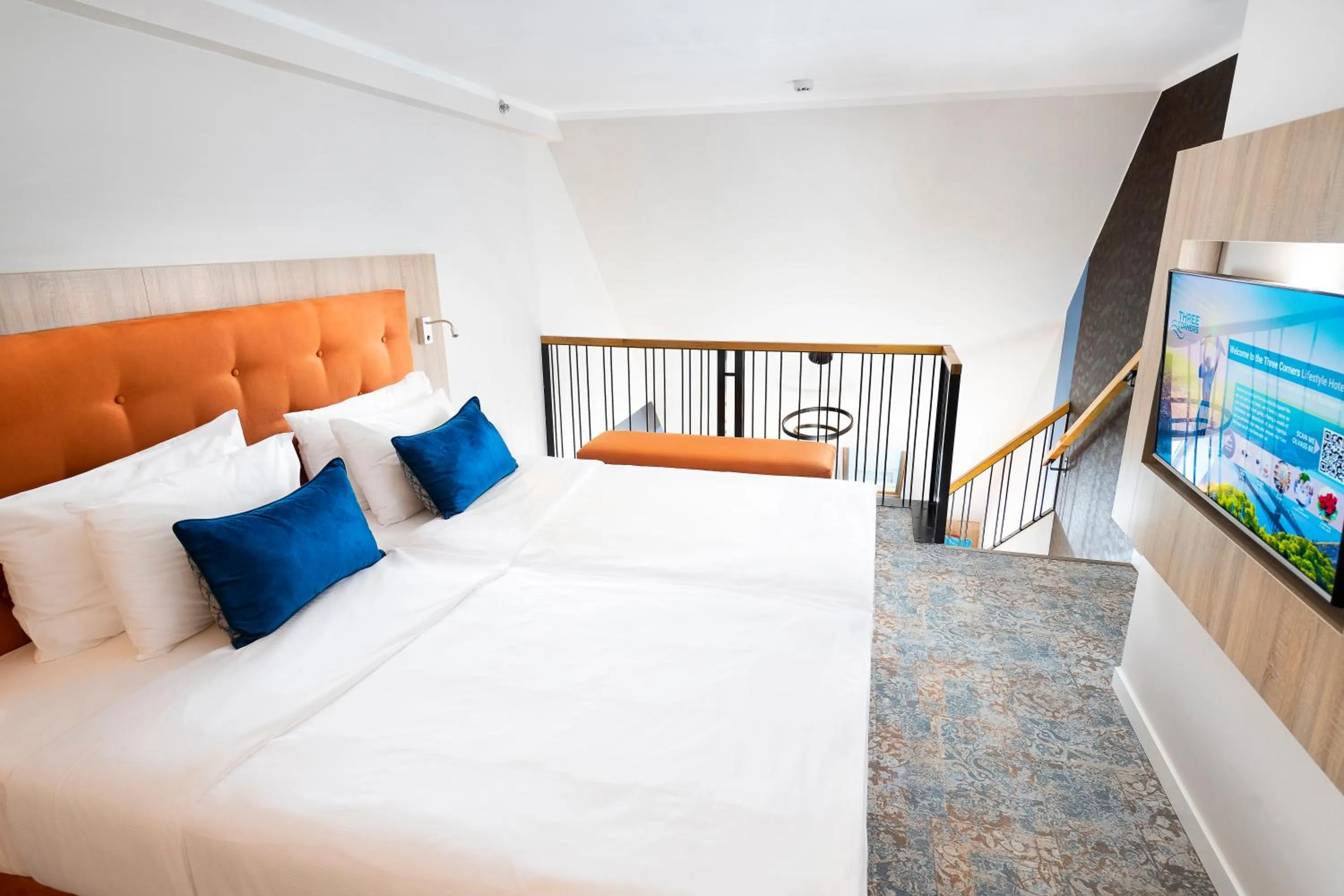 Bed in Three Corners Lifestyle Hotel