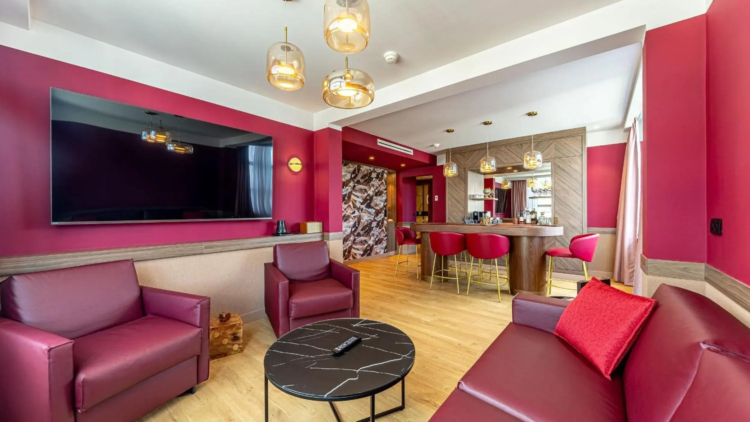 Living room in Golden Tulip Aix les Bains - Hotel & Spa Living room in Golden Tulip Aix les Bains - Hotel & Spa