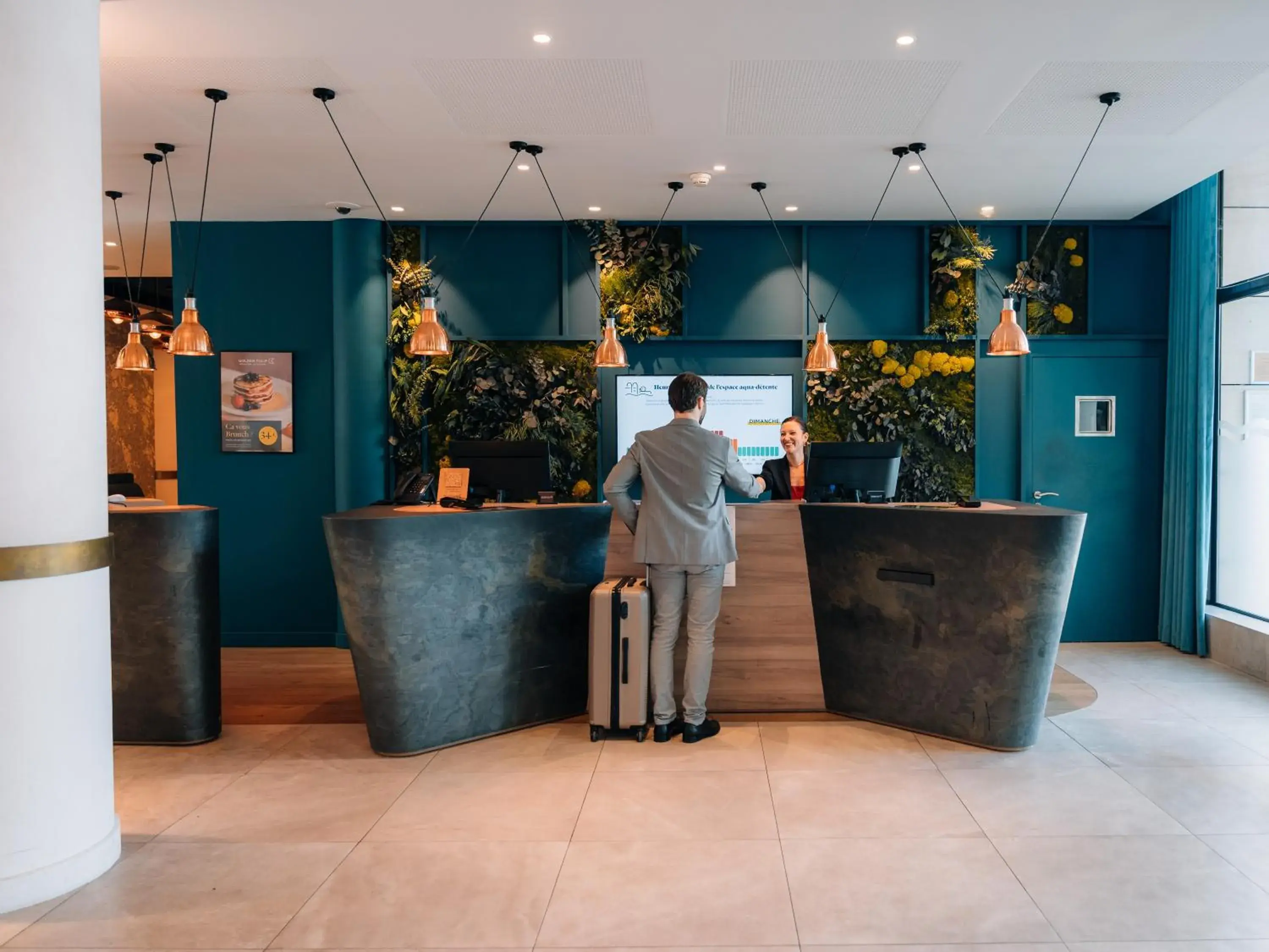 Lobby or reception in Golden Tulip Aix les Bains - Hotel & Spa Lobby or reception in Golden Tulip Aix les Bains - Hotel & Spa