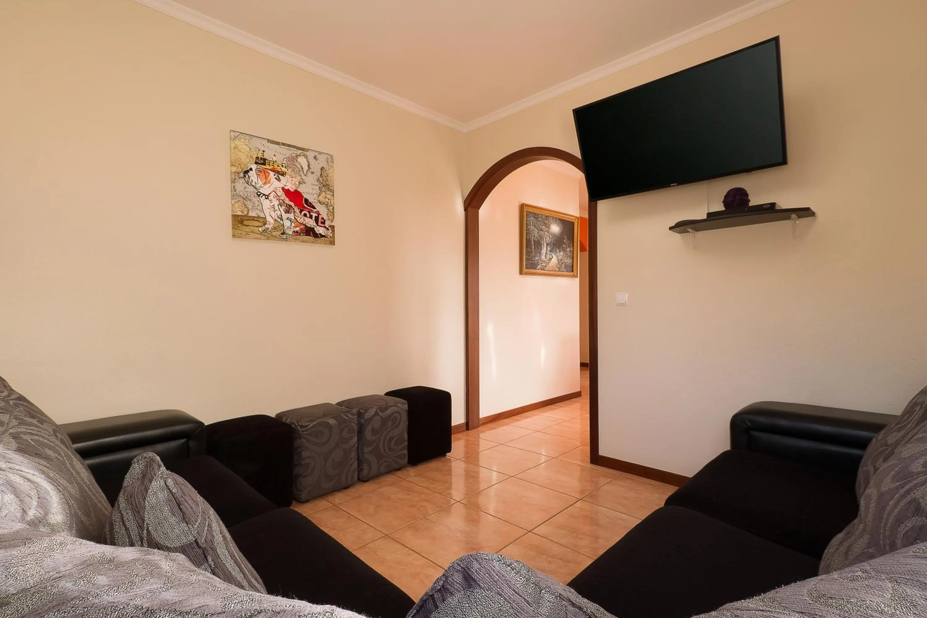 Communal lounge/ TV room in Paradise House Calheta