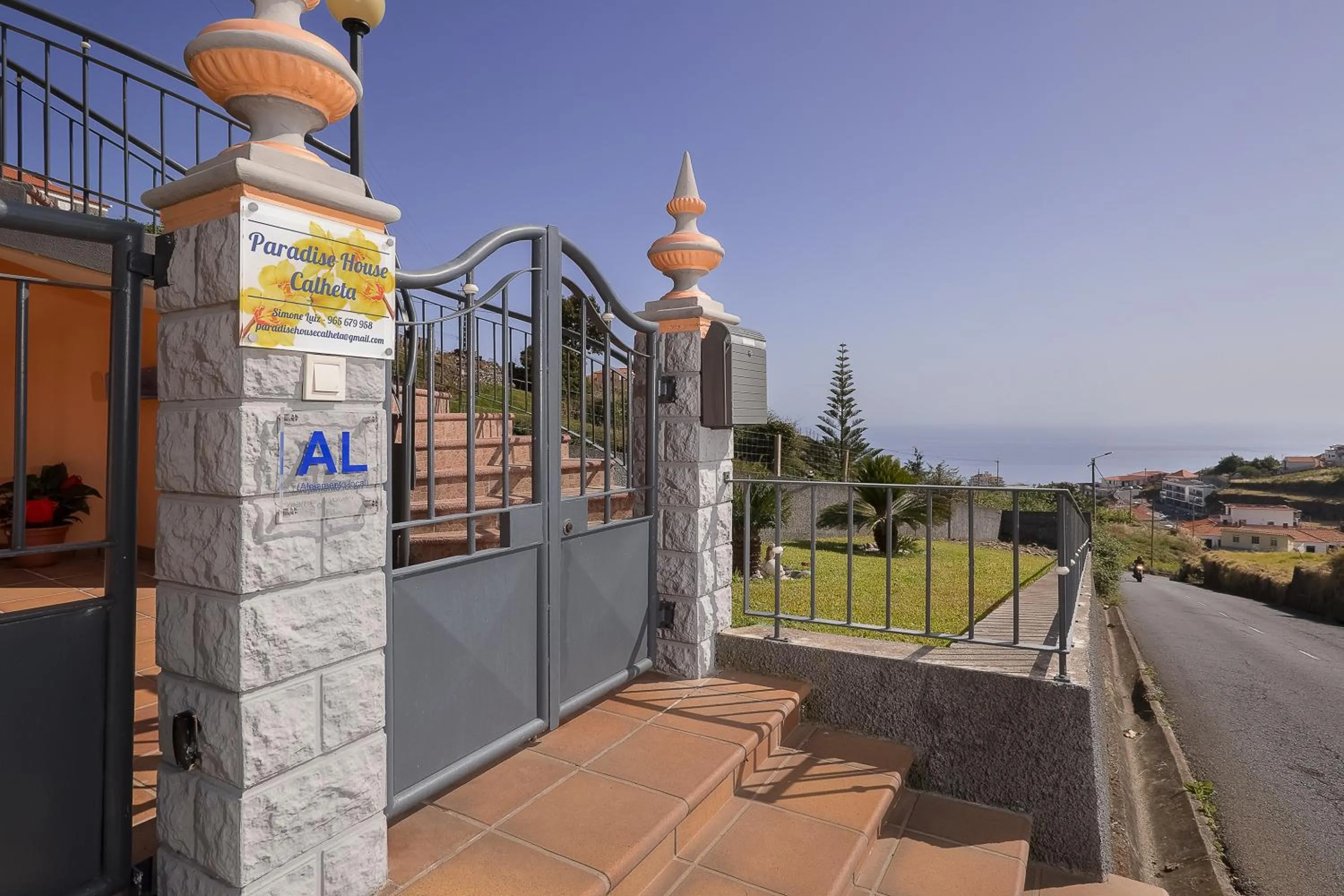 Property logo or sign in Paradise House Calheta