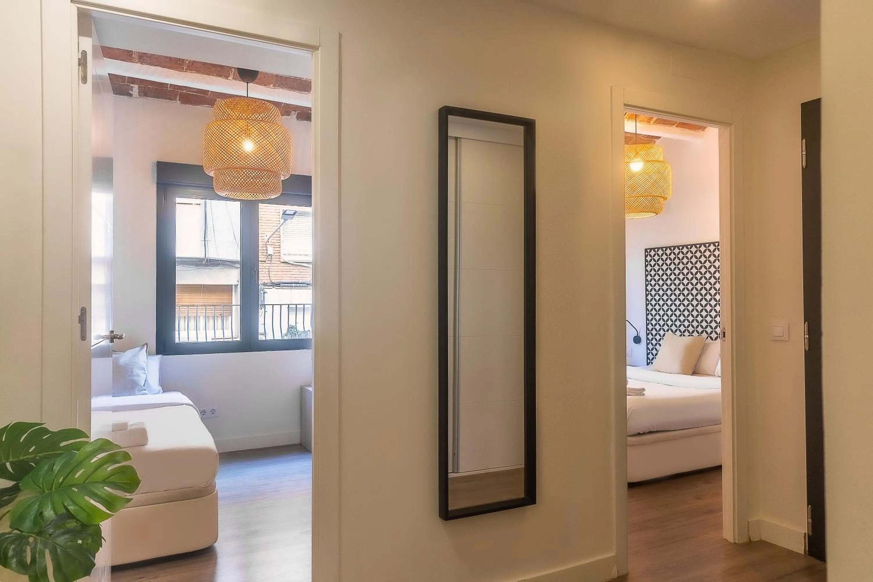 Bed in Modern Catalan Apartments by Olala Homes