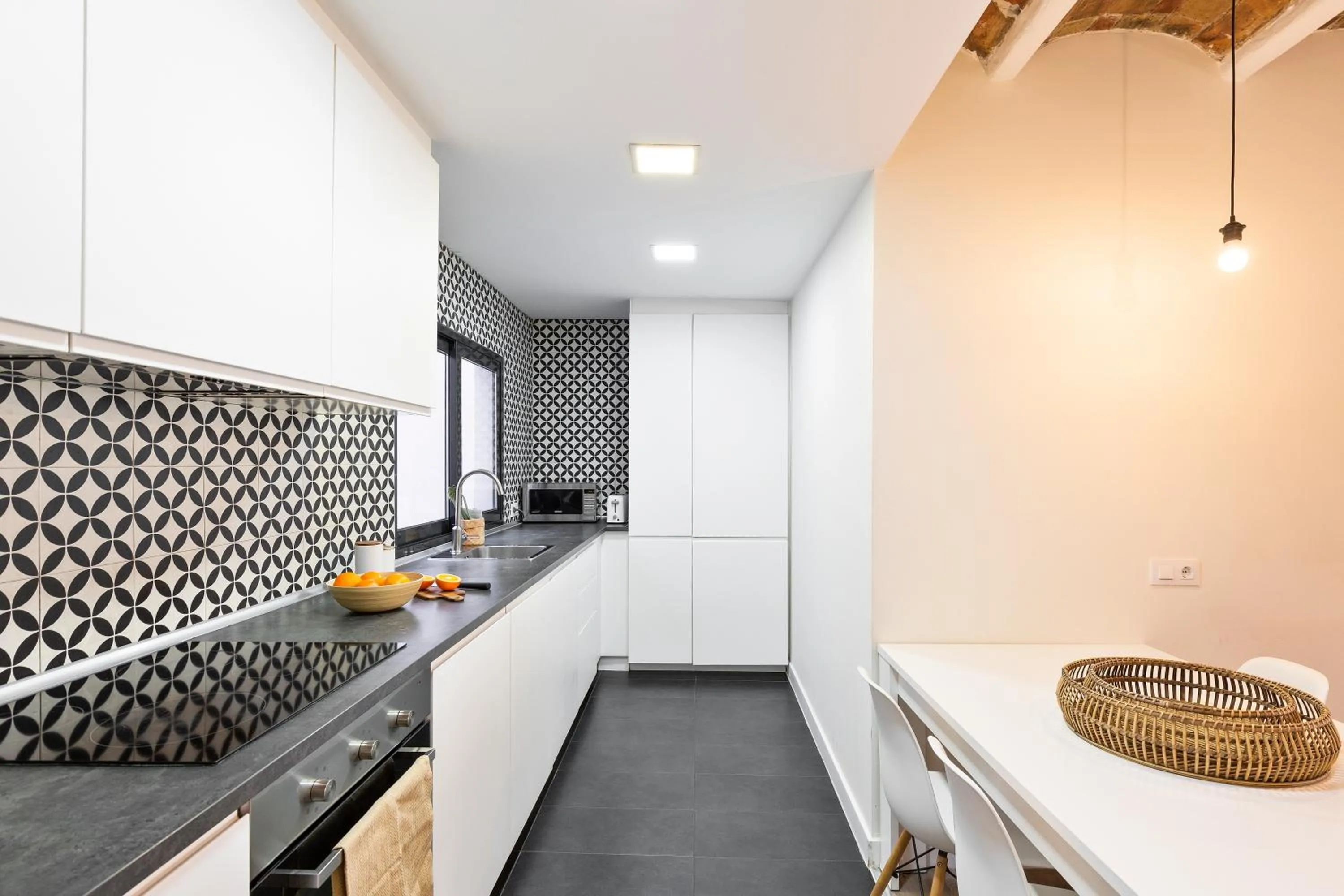 kitchen in Modern Catalan Apartments by Olala Homes