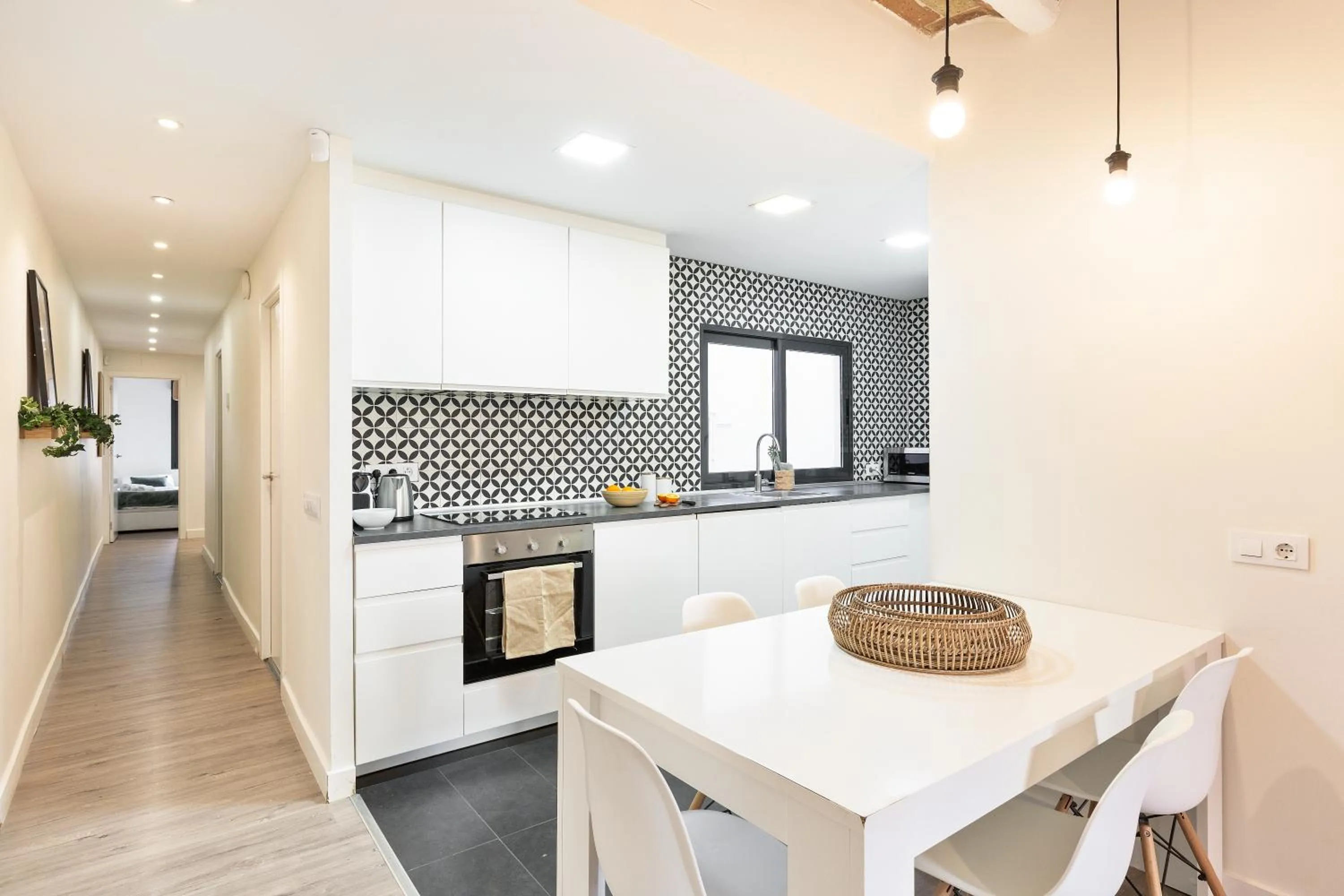 Dining area in Modern Catalan Apartments by Olala Homes