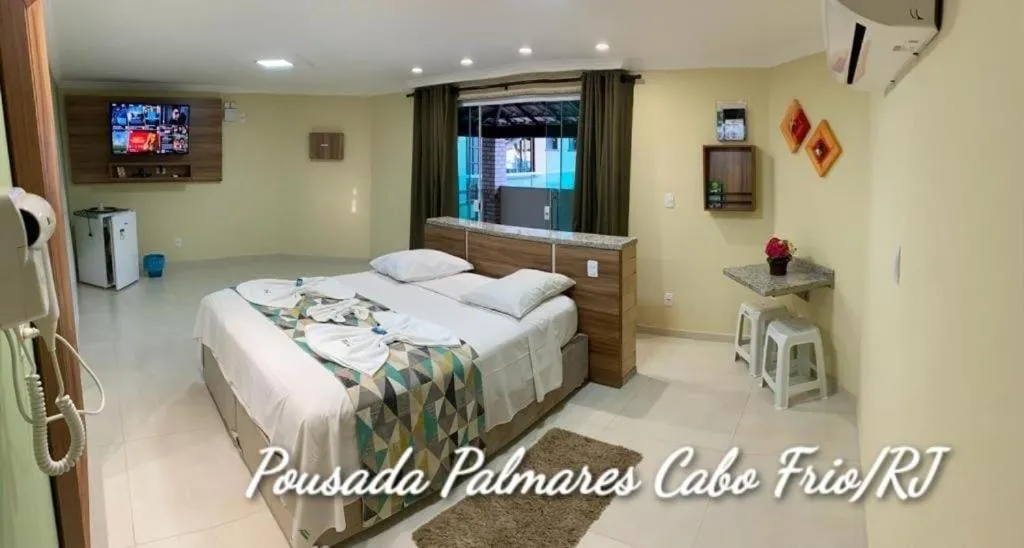Bed in Pousada Palmares