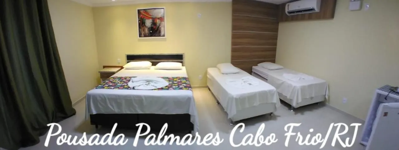Bed in Pousada Palmares
