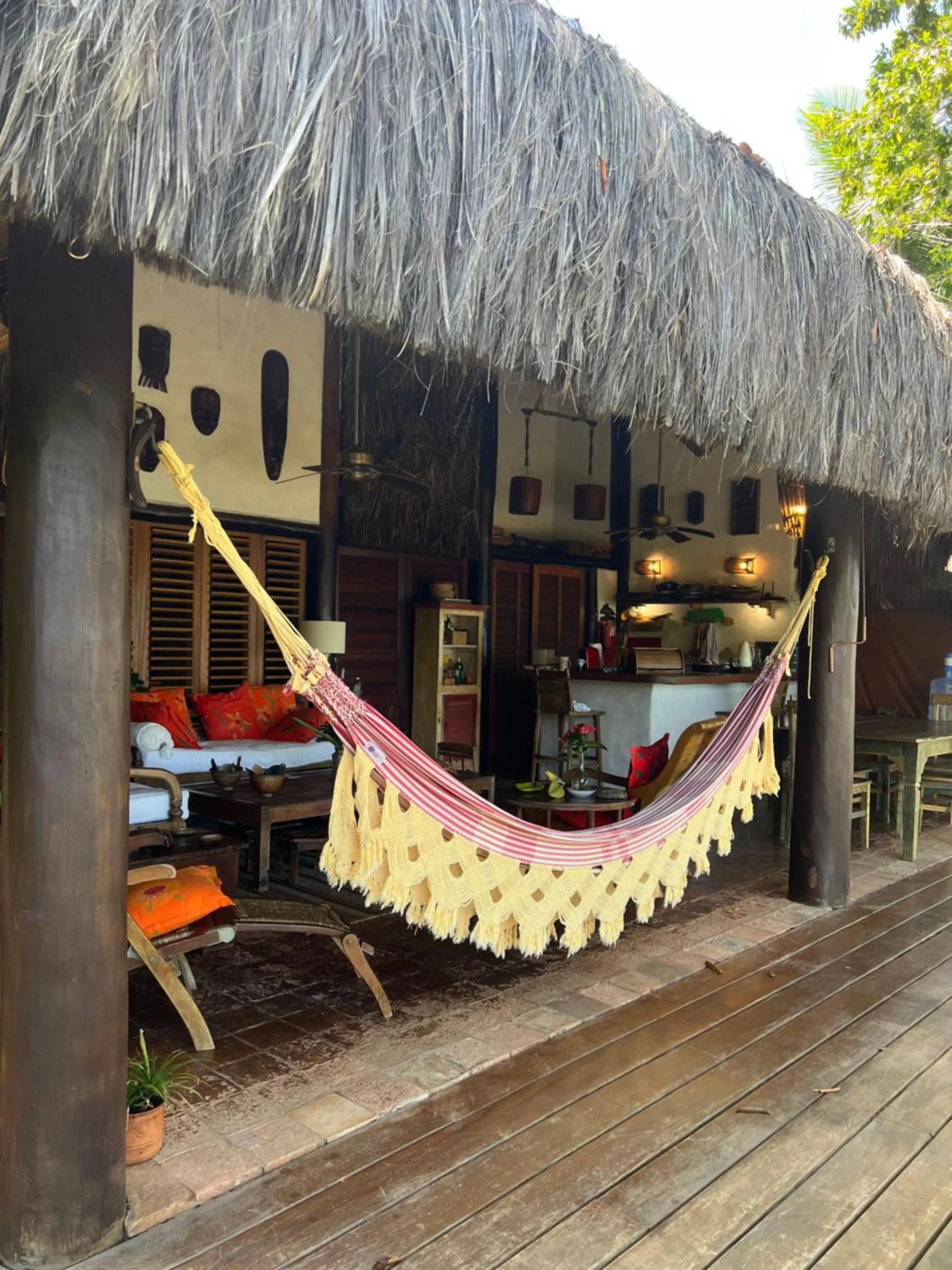 Patio in Charmoso bangalô balinês pé na areia Outeiro das Brisas