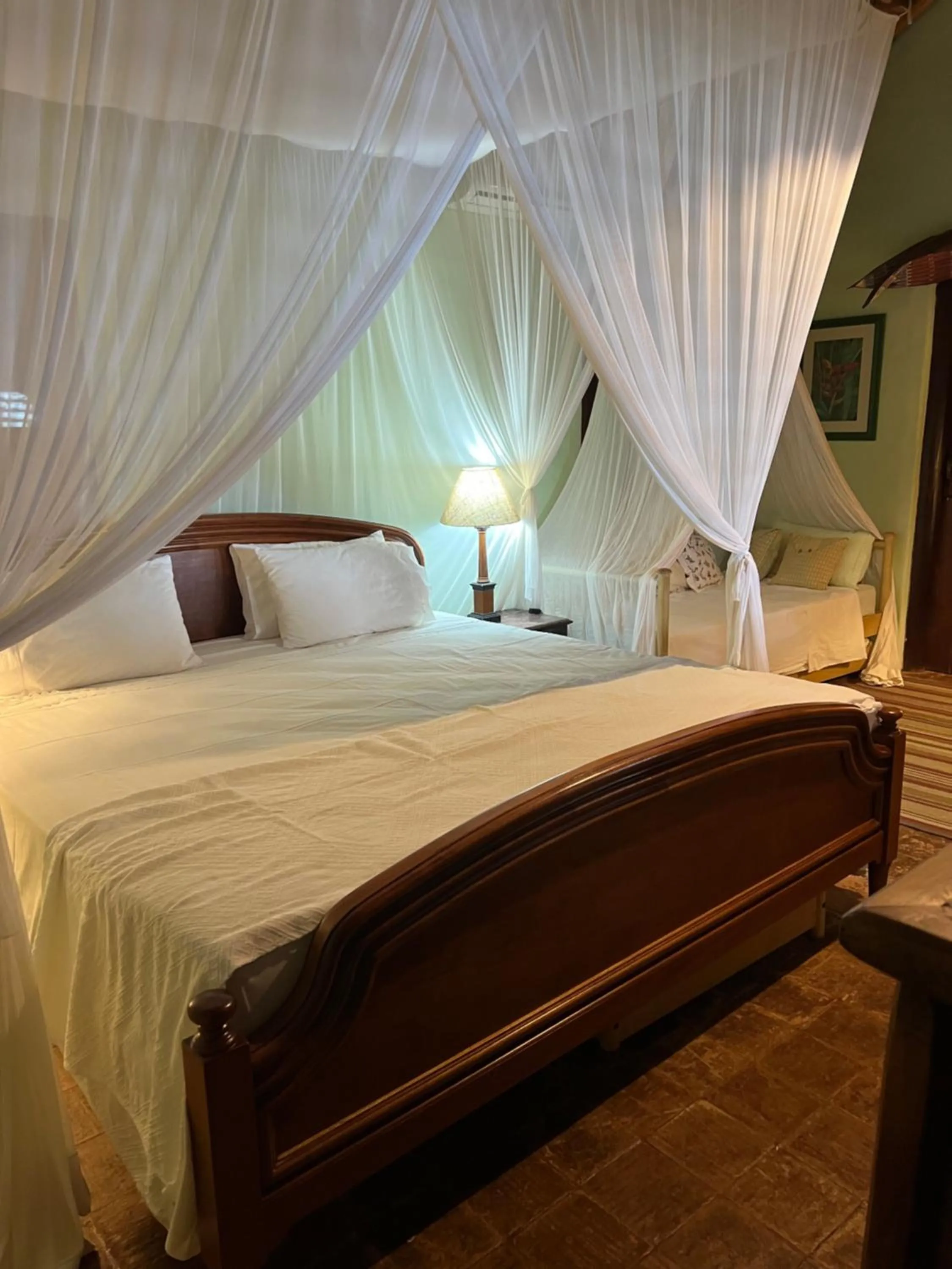 Bed in Charmoso bangalô balinês pé na areia Outeiro das Brisas