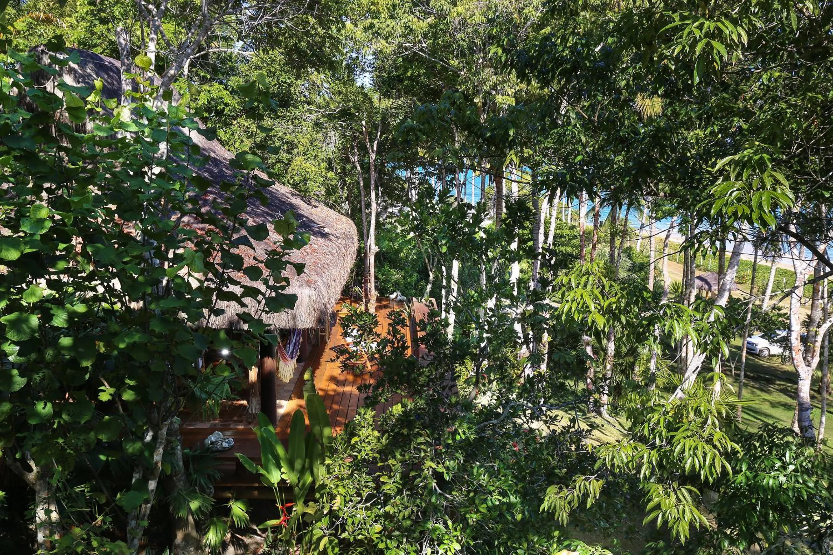 Garden in Charmoso bangalô balinês pé na areia Outeiro das Brisas