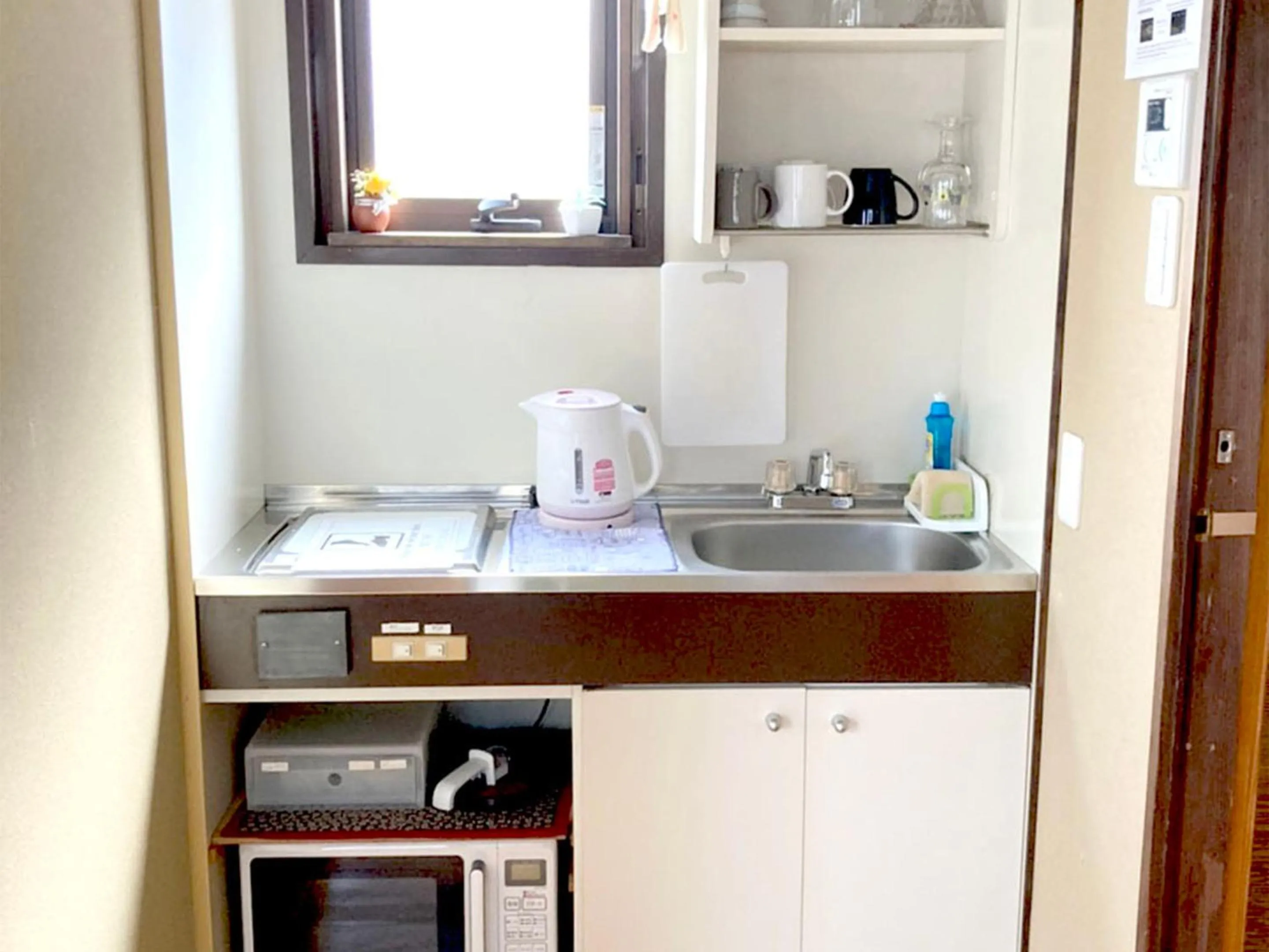 Kitchen or kitchenette in Kevin's Place