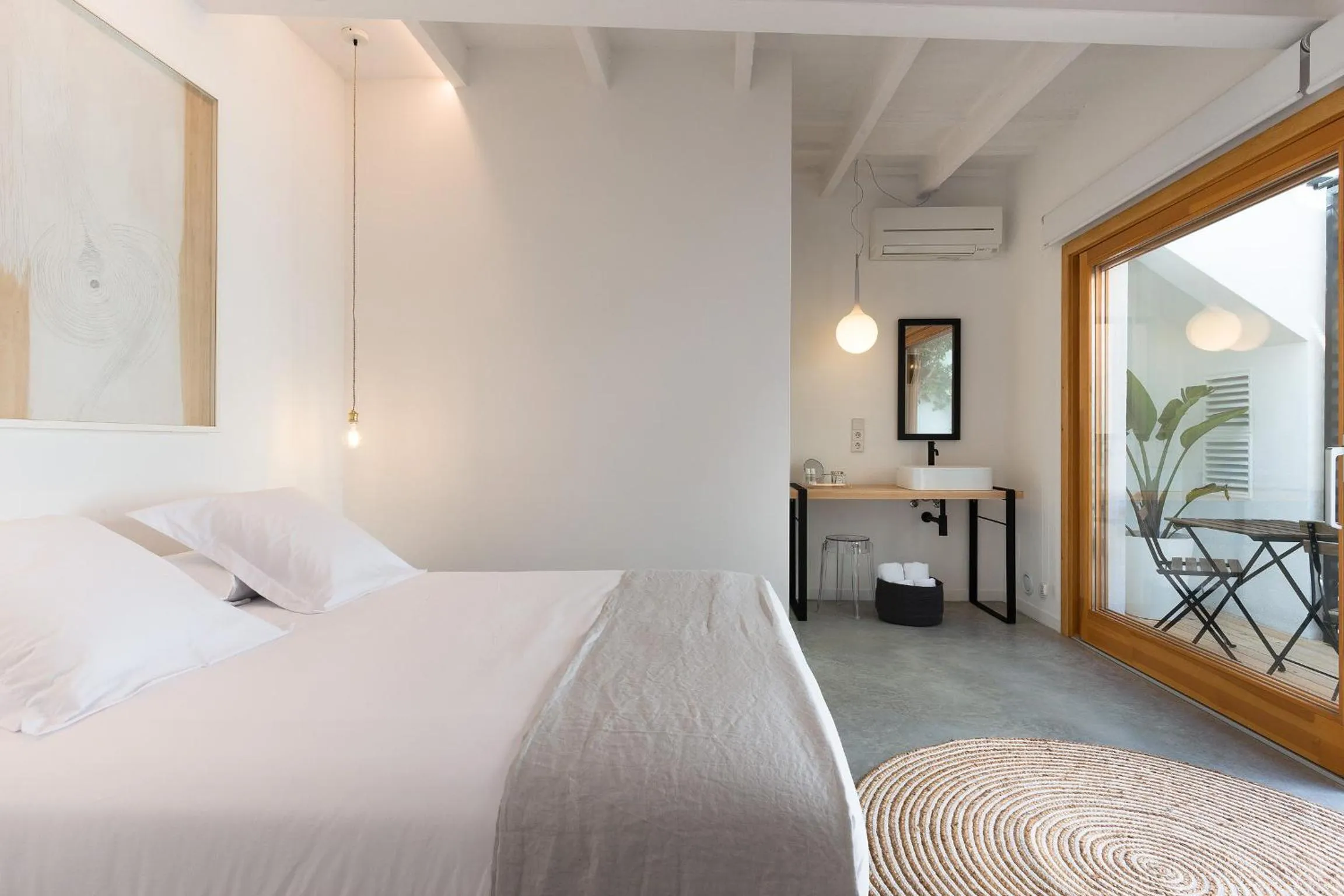 Bed in Sodium Boutique Hotel