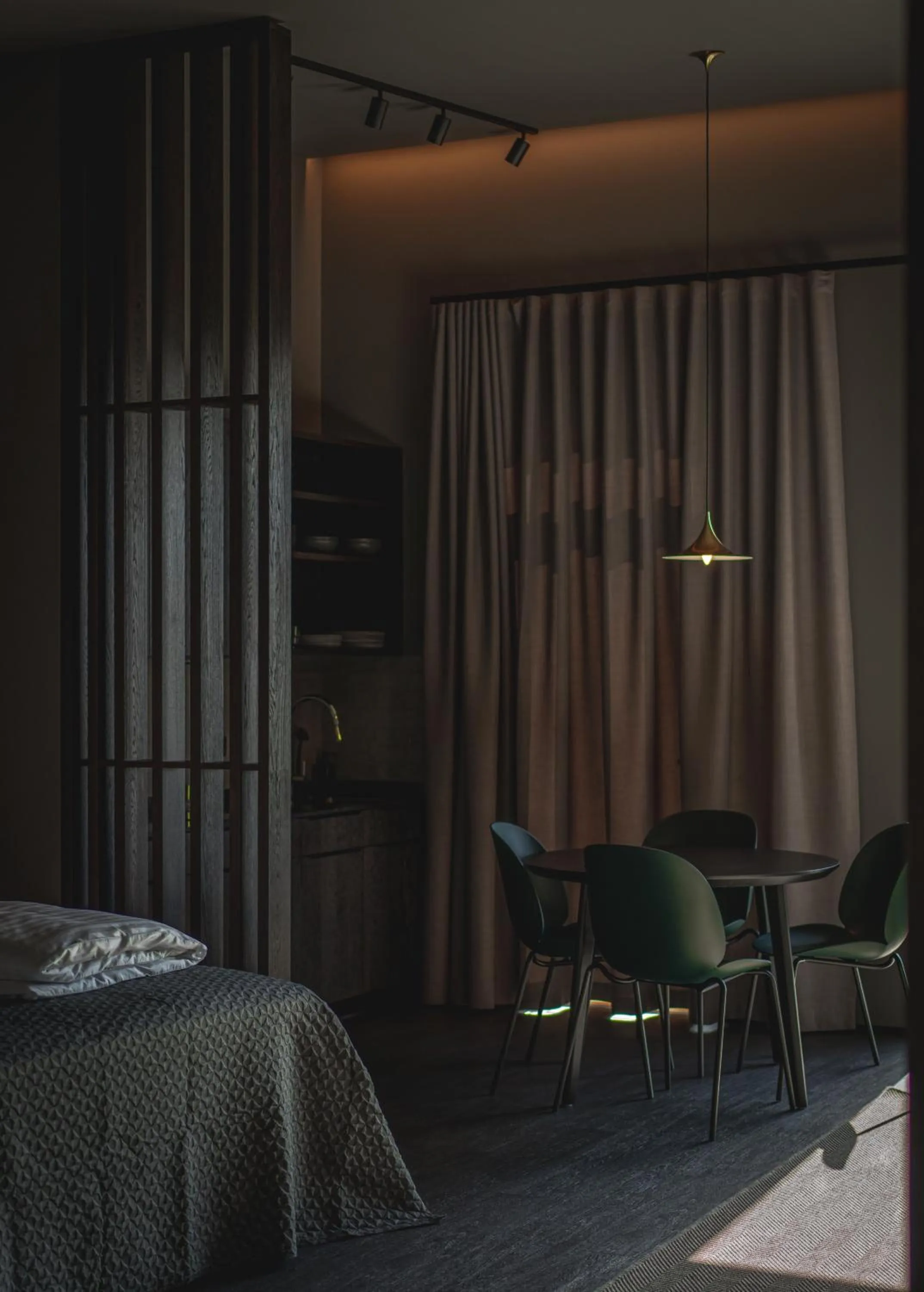 Bed in Black Beach Suites