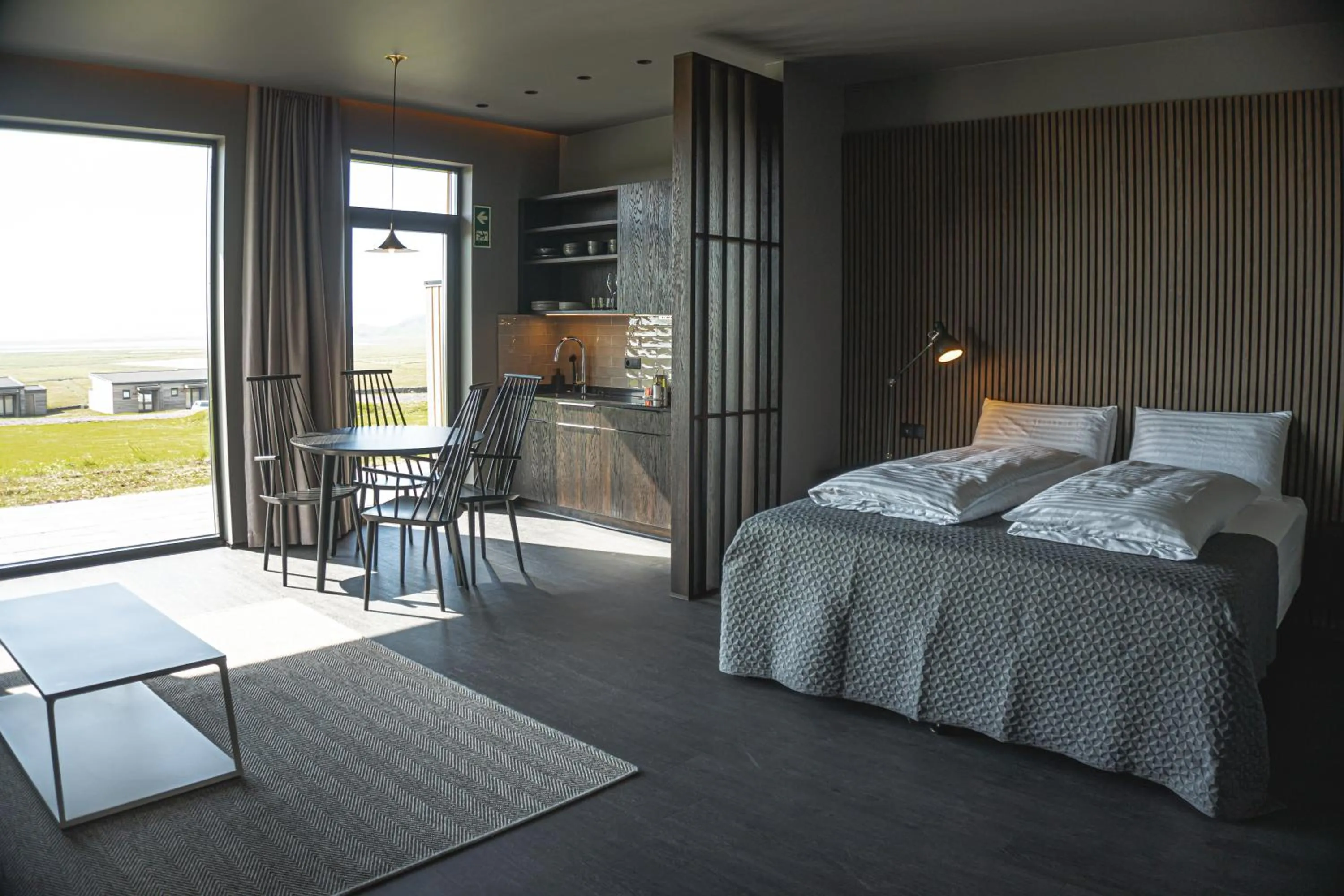 Bed in Black Beach Suites