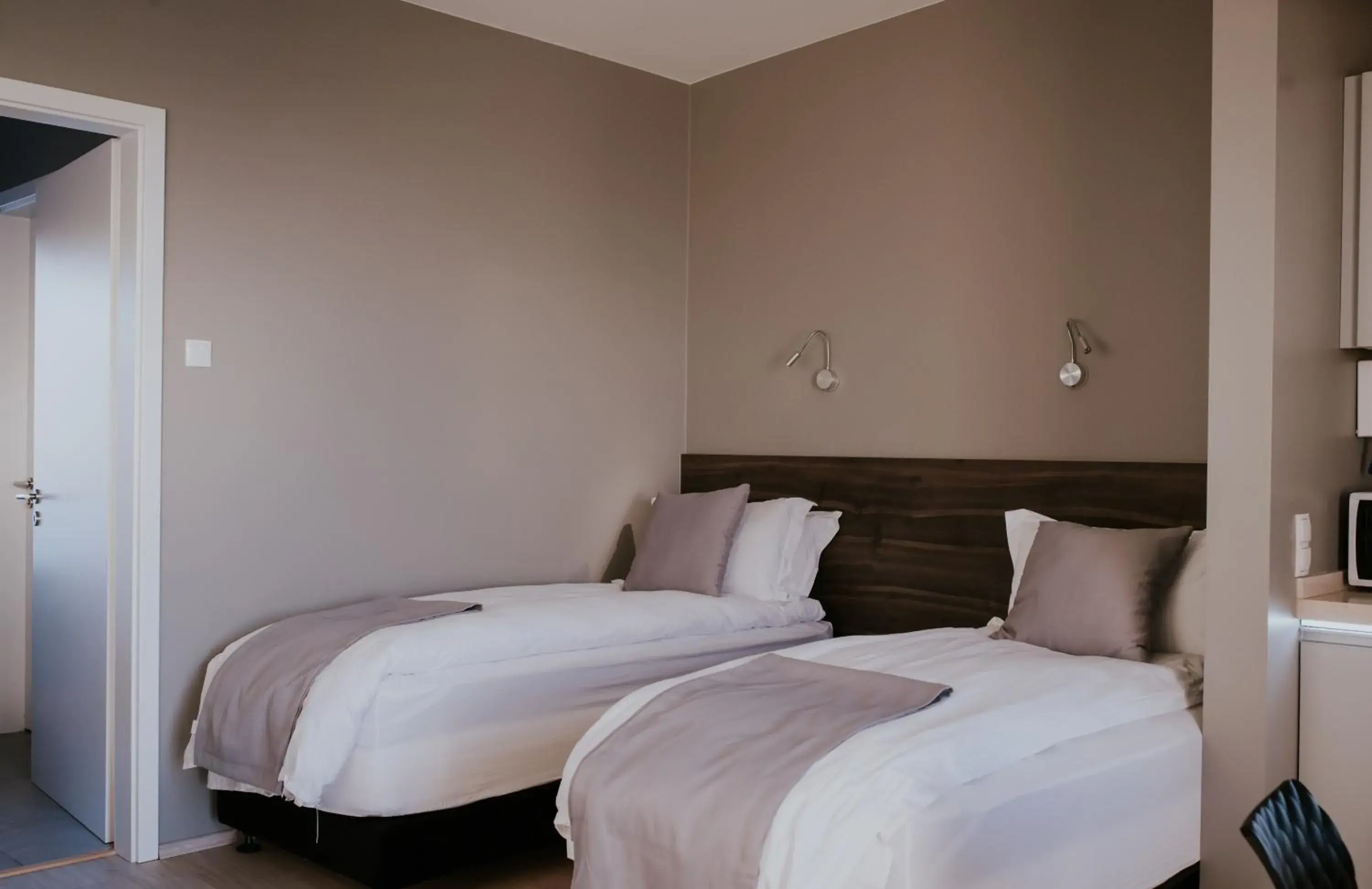 Bed in Black Beach Suites Bed in Black Beach Suites