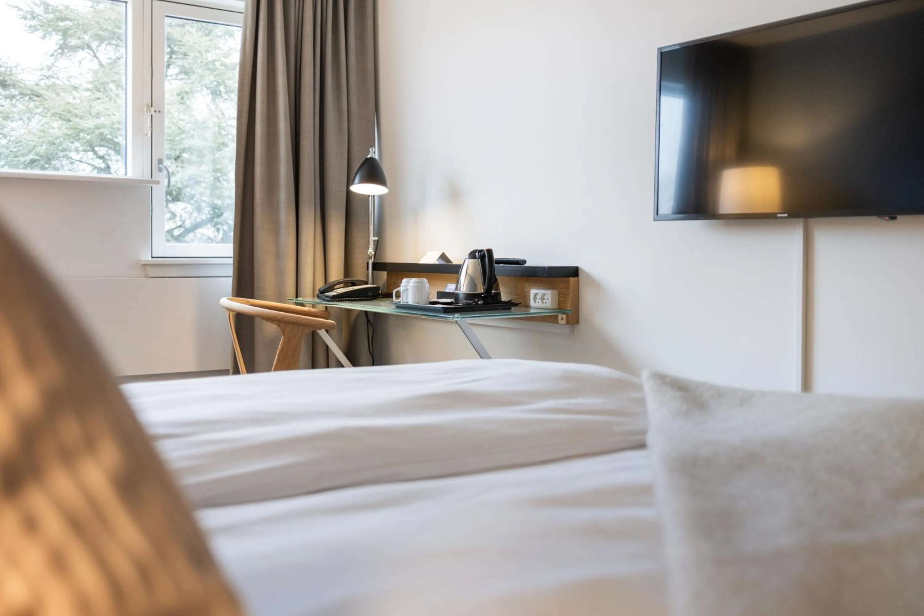 Bed in Gentofte Hotel