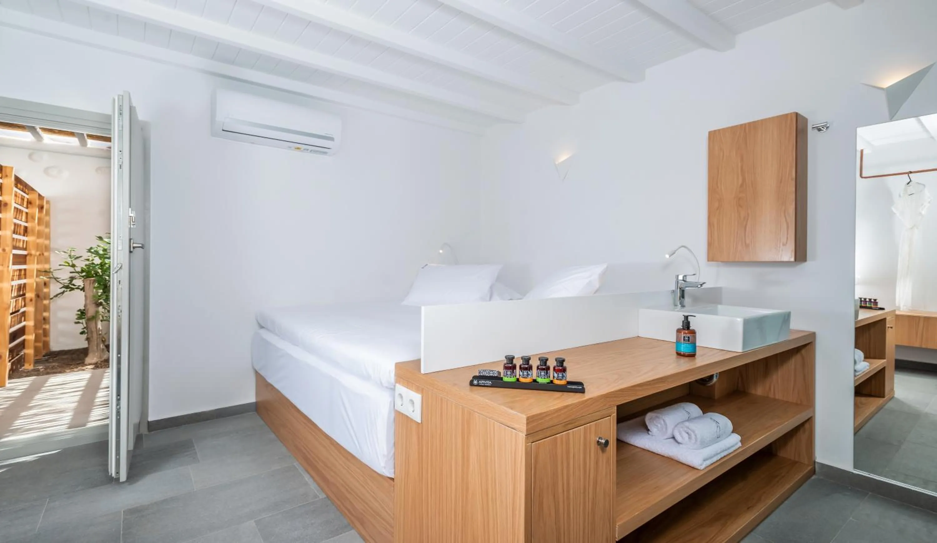 Bed in Dreambox Mykonos Suites and Mini Villas