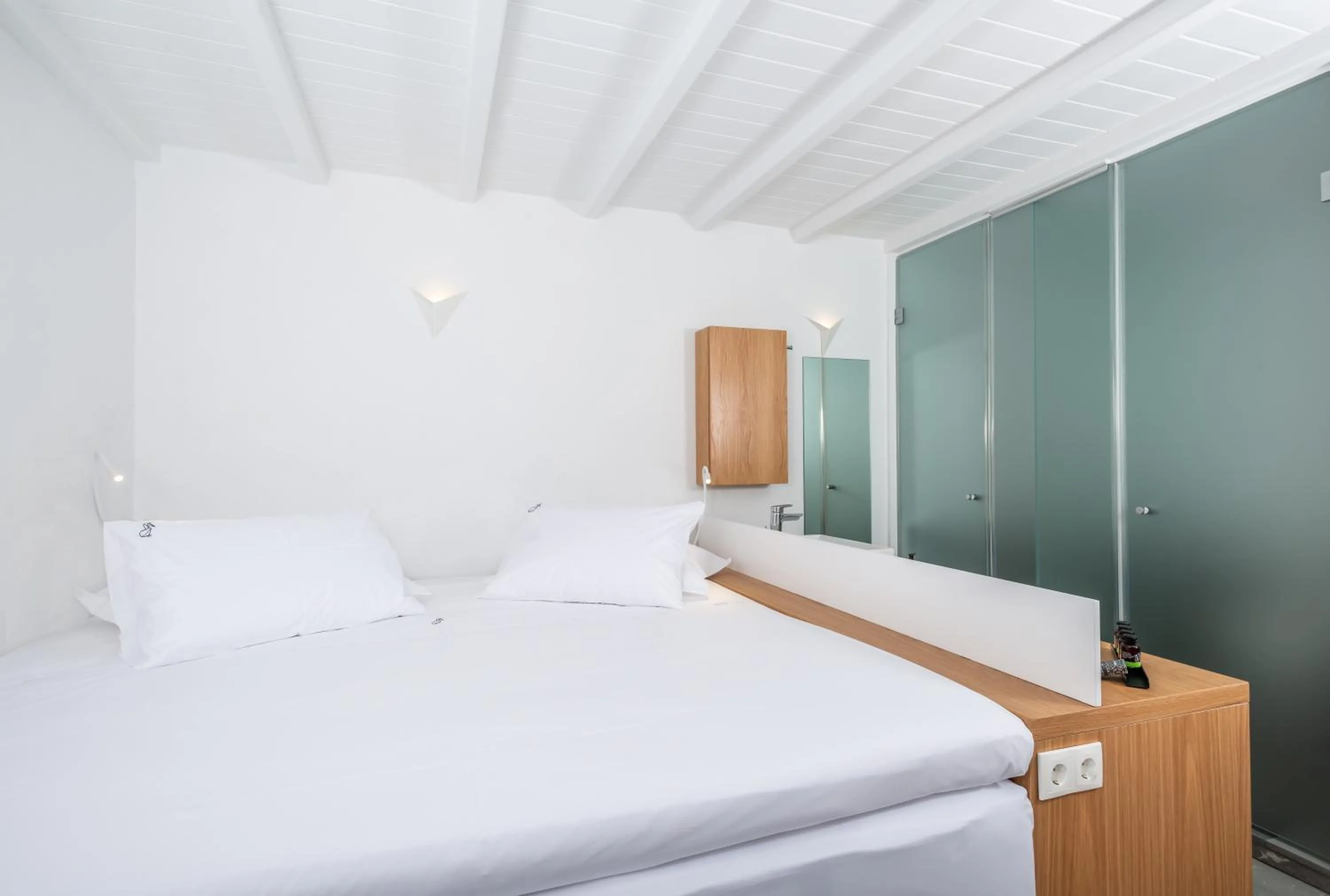 Bathroom, Bed in Dreambox Mykonos Suites and Mini Villas