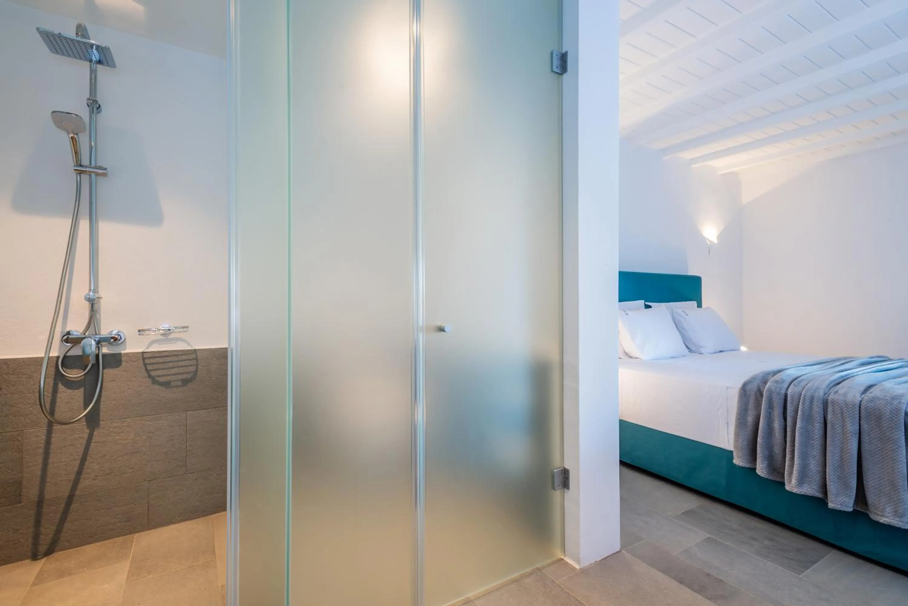 Bathroom, Bed in Dreambox Mykonos Suites and Mini Villas