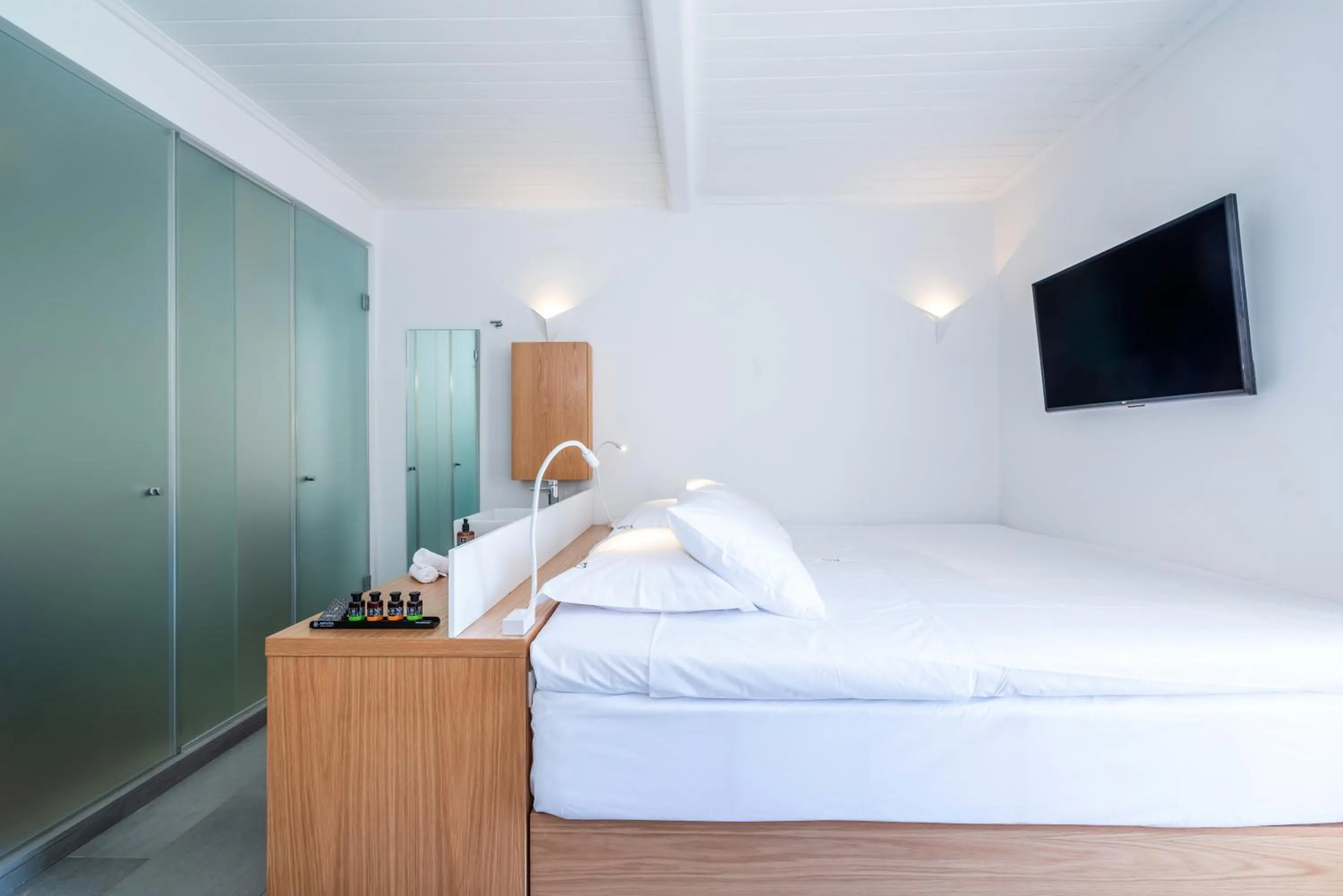 Bathroom, Bed in Dreambox Mykonos Suites and Mini Villas