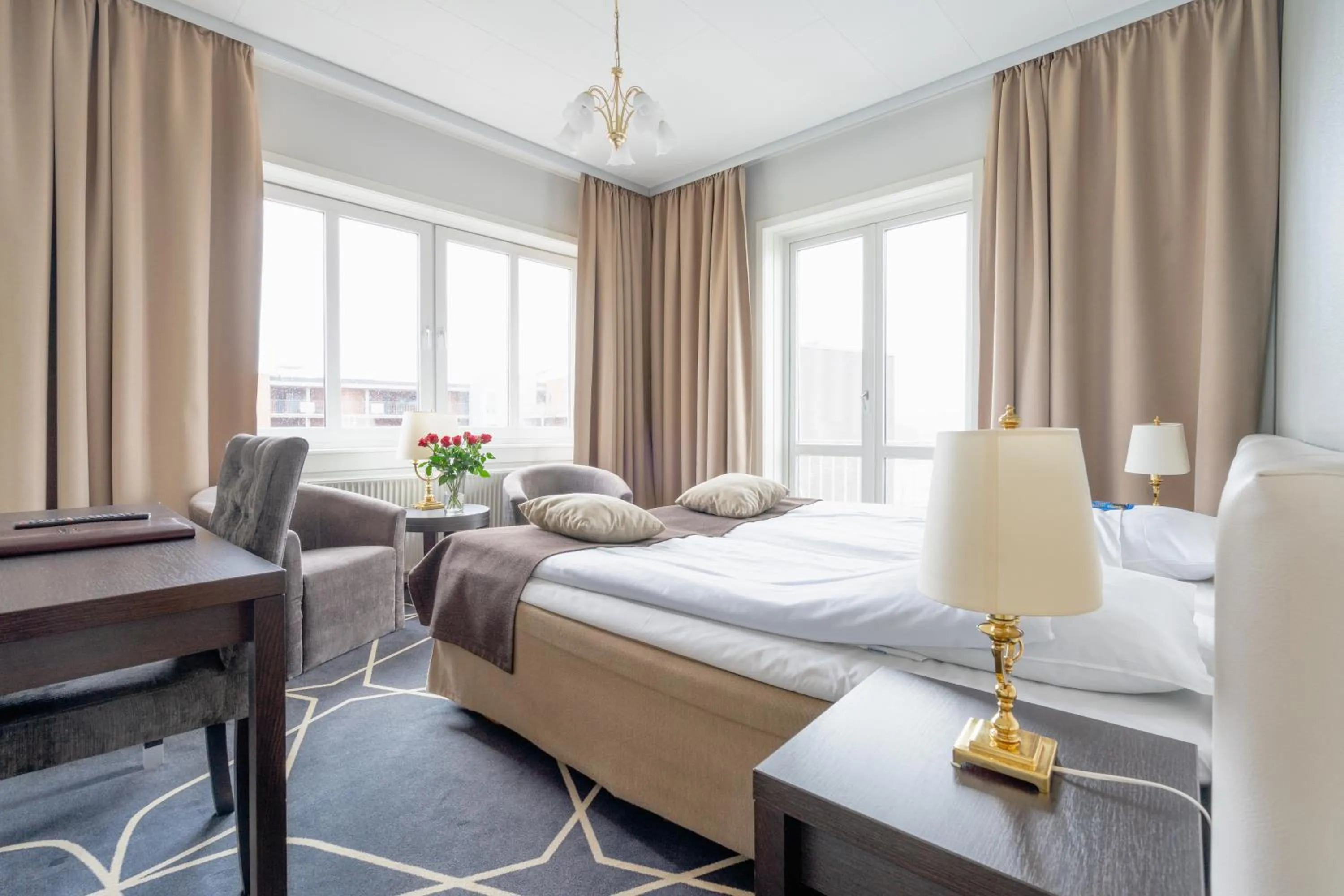 Living room, Bed in Hotel Dania