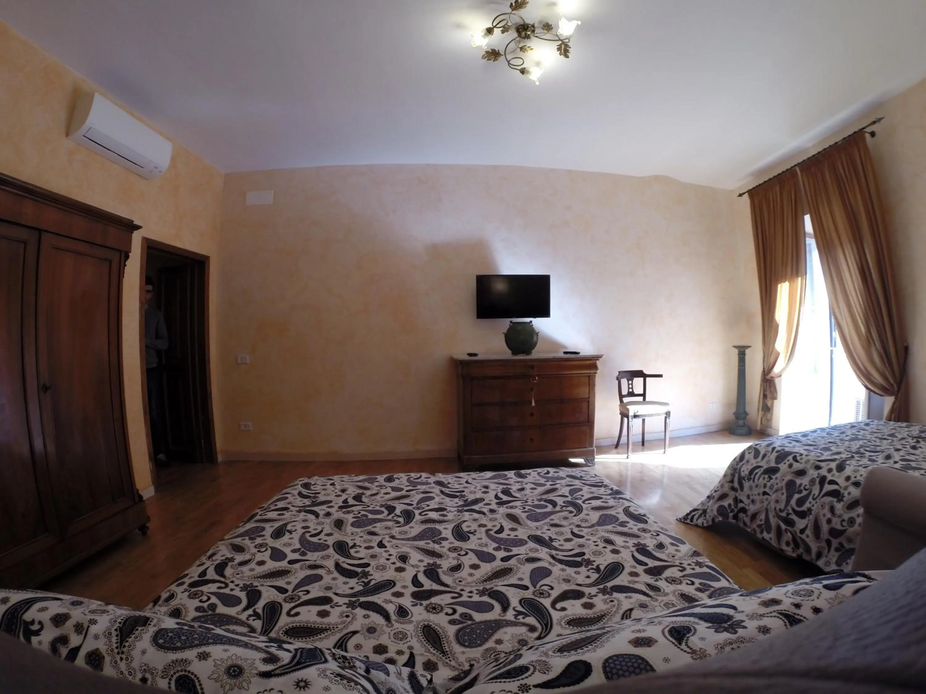 Bed in Pantheon Old Suite