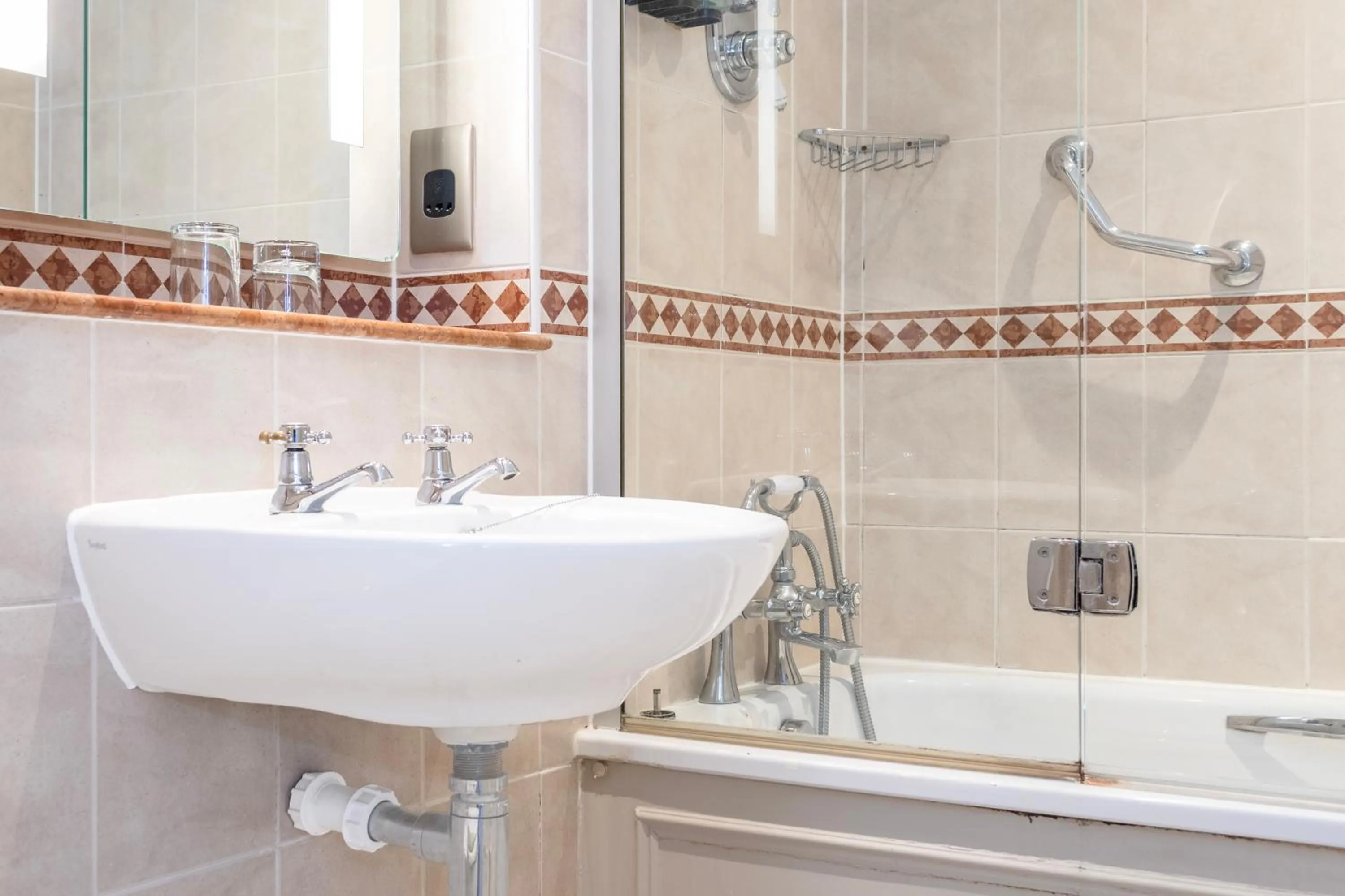 Bathroom in Winchester Wessex Hotel by Sunday