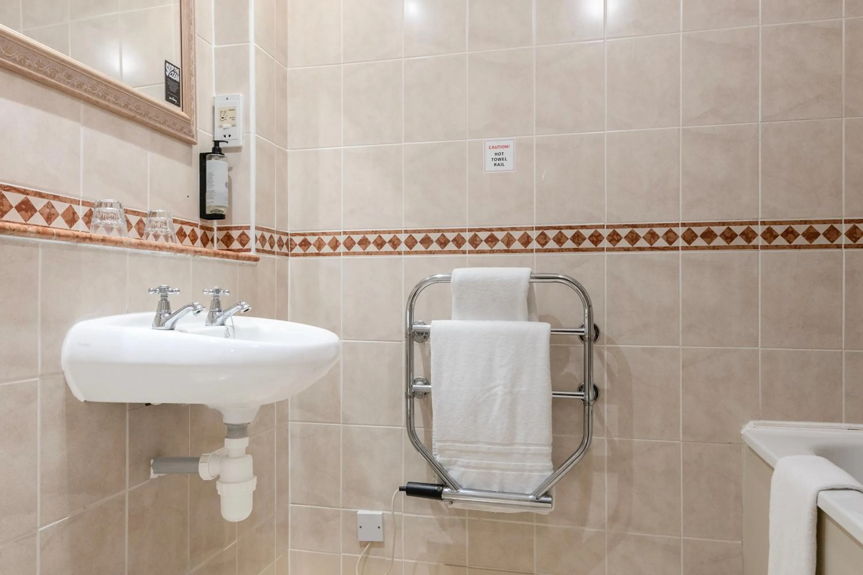 Bathroom in Winchester Wessex Hotel by Sunday