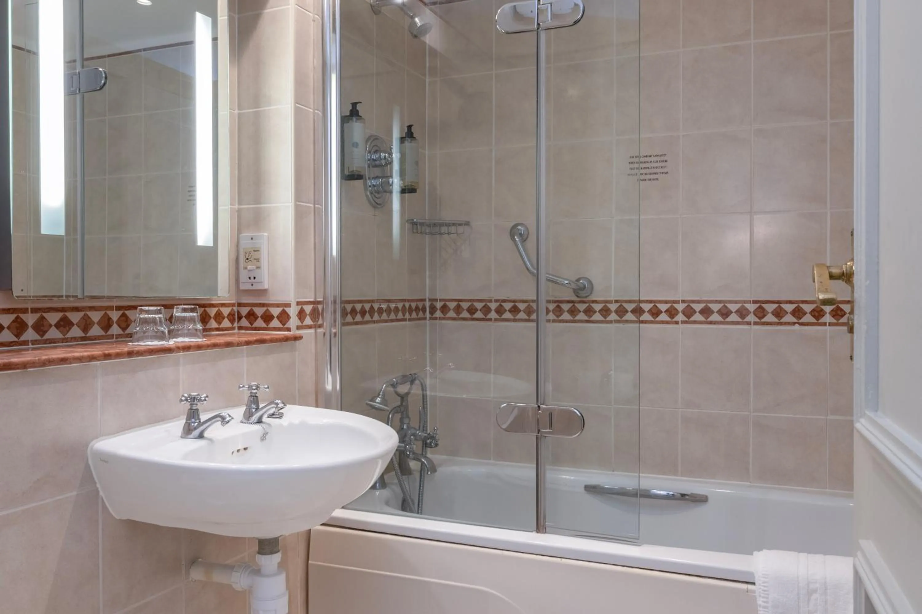 Bathroom in Winchester Wessex Hotel by Sunday